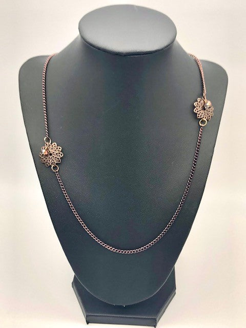 Chocolate curb chain with filigree flower bead necklace