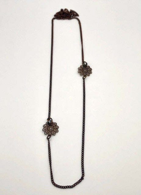 Chocolate curb chain with filigree flower bead necklace