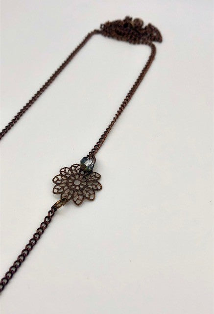 Chocolate curb chain with filigree flower bead necklace