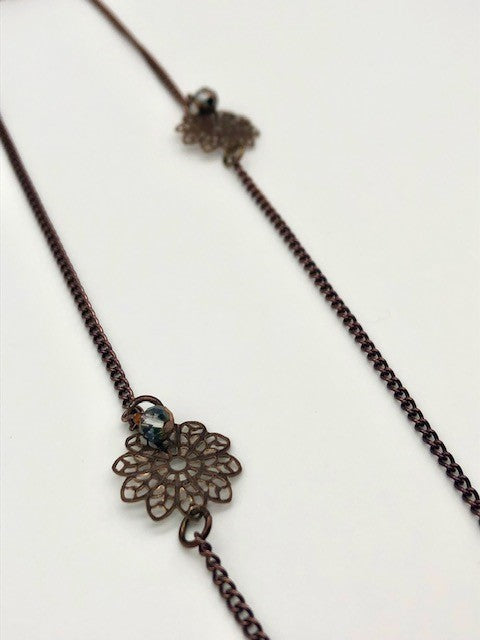 Chocolate curb chain with filigree flower bead necklace