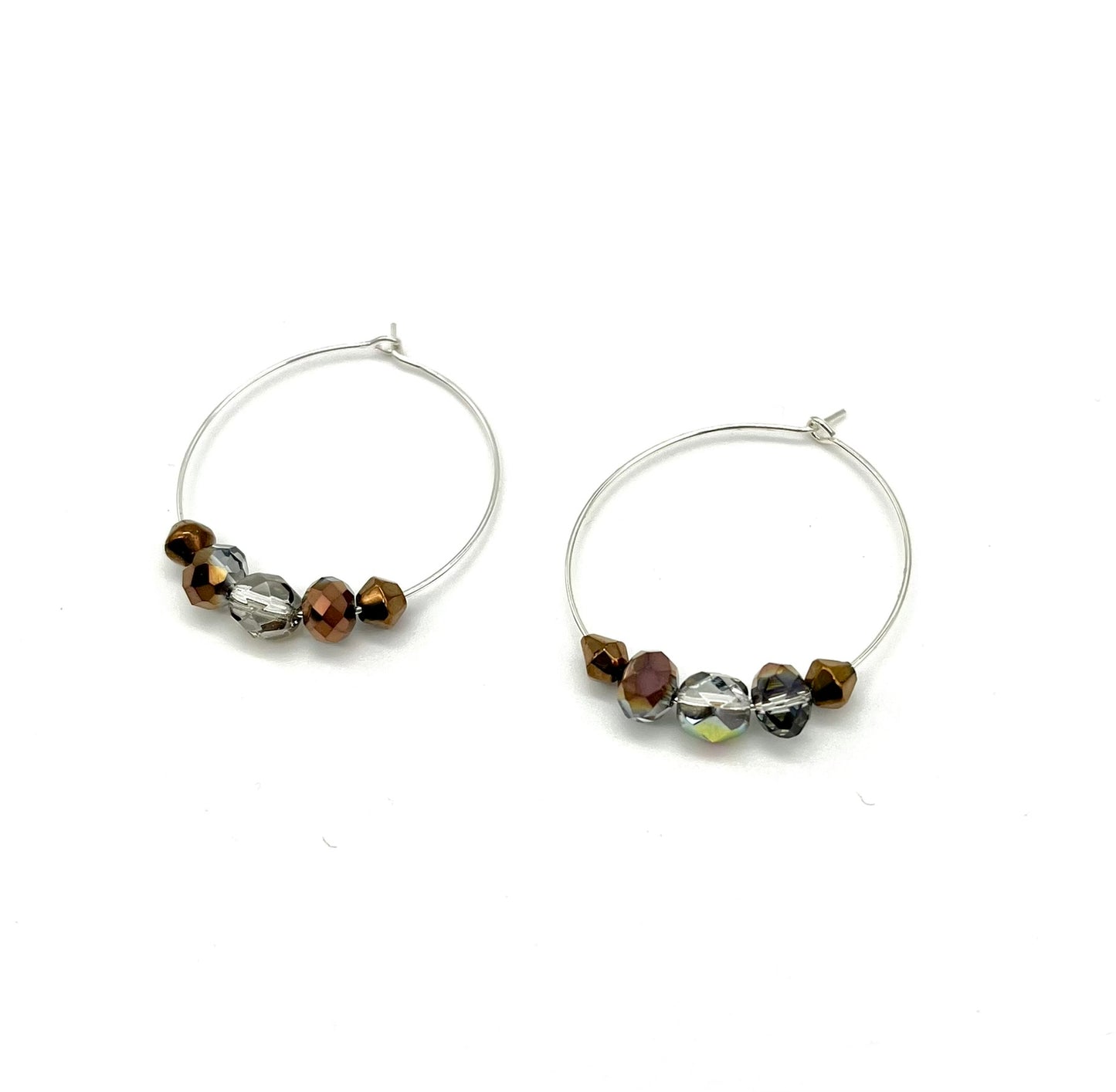 Silver hoop earrings with glass bead detail