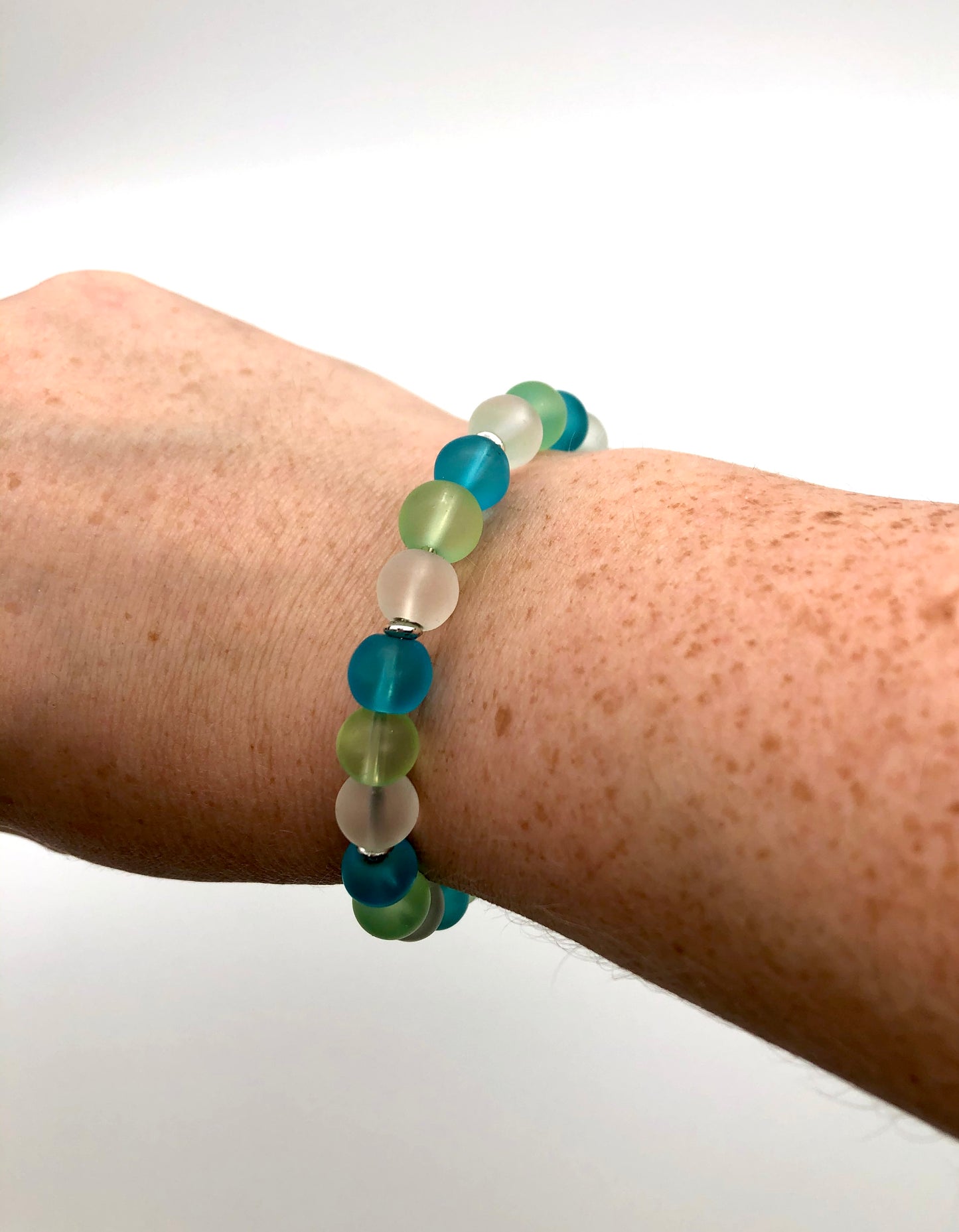 Aqua, light green, and white frosted beads memory wire bracelet