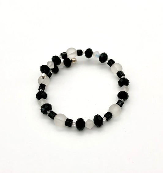 Black faceted and cube beads and white faceted beads memory wire bracelet