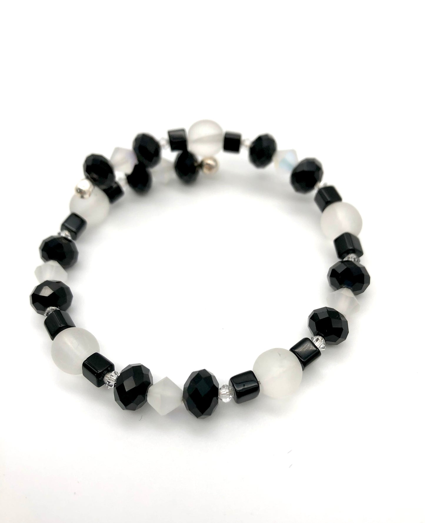 Black faceted and cube beads and white faceted beads memory wire bracelet
