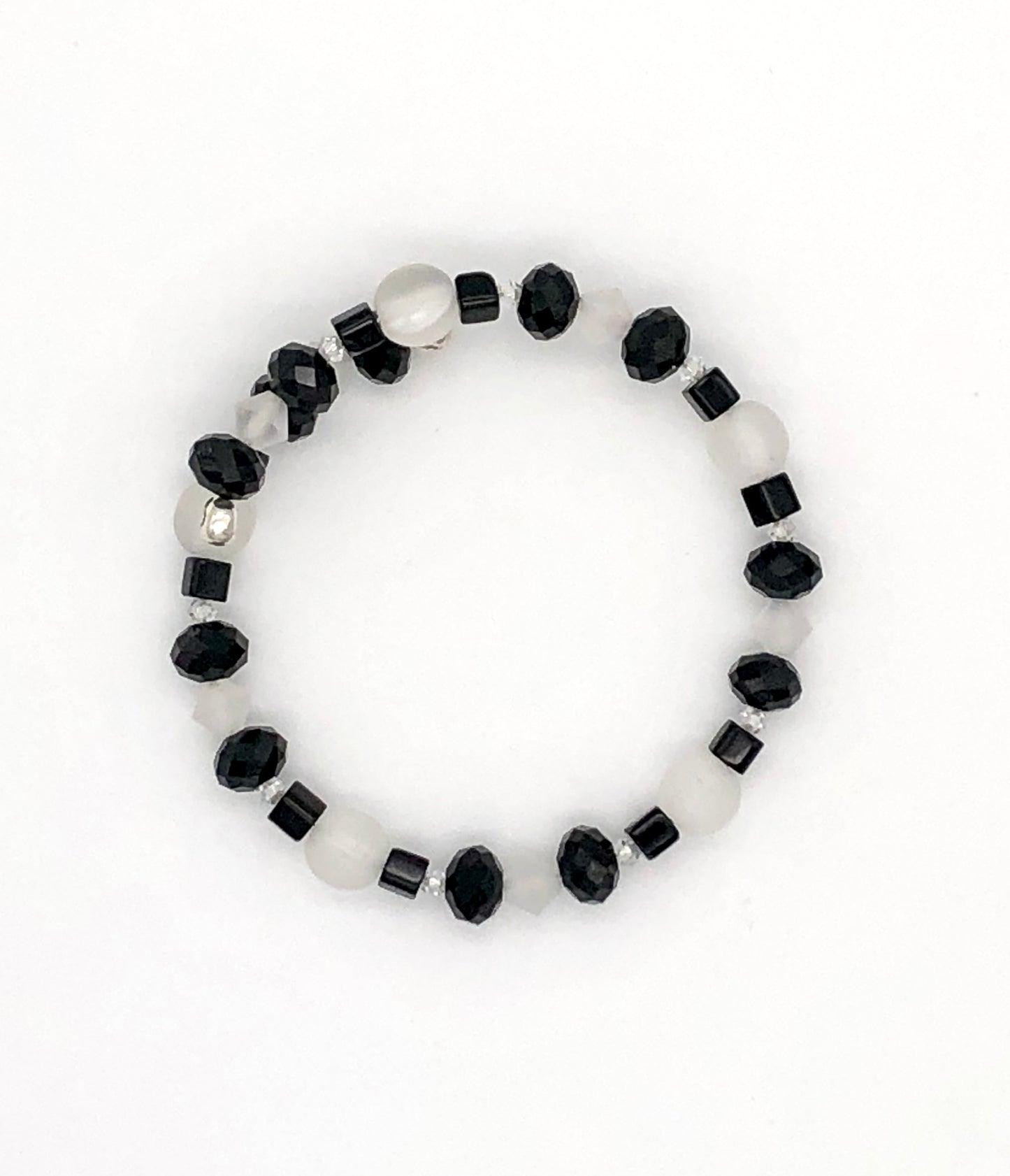 Black faceted and cube beads and white faceted beads memory wire bracelet