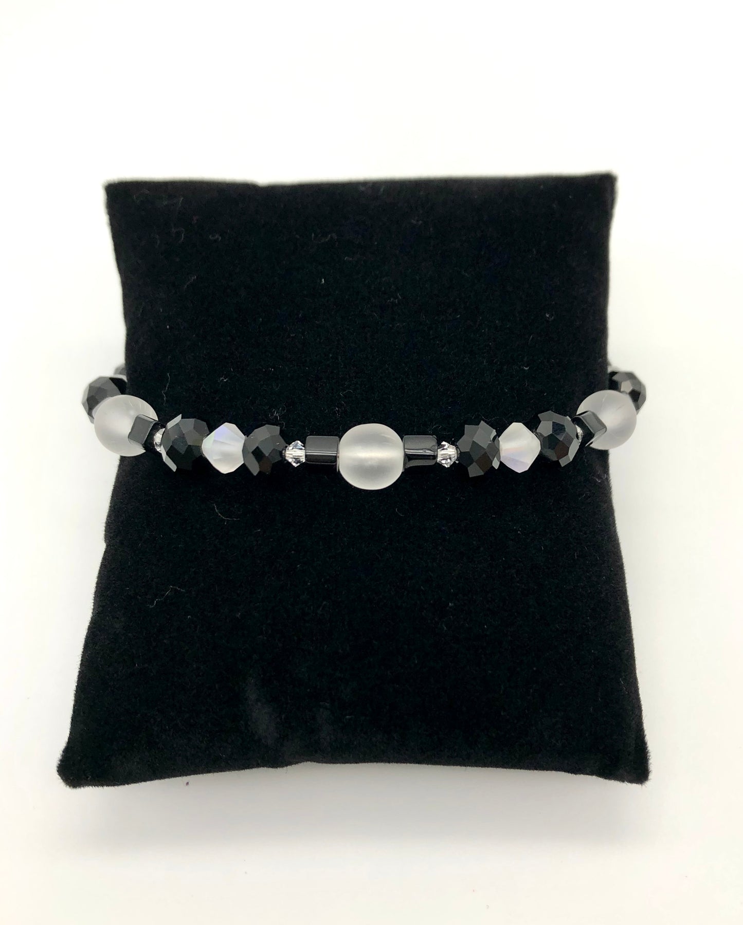 Black faceted and cube beads and white faceted beads memory wire bracelet