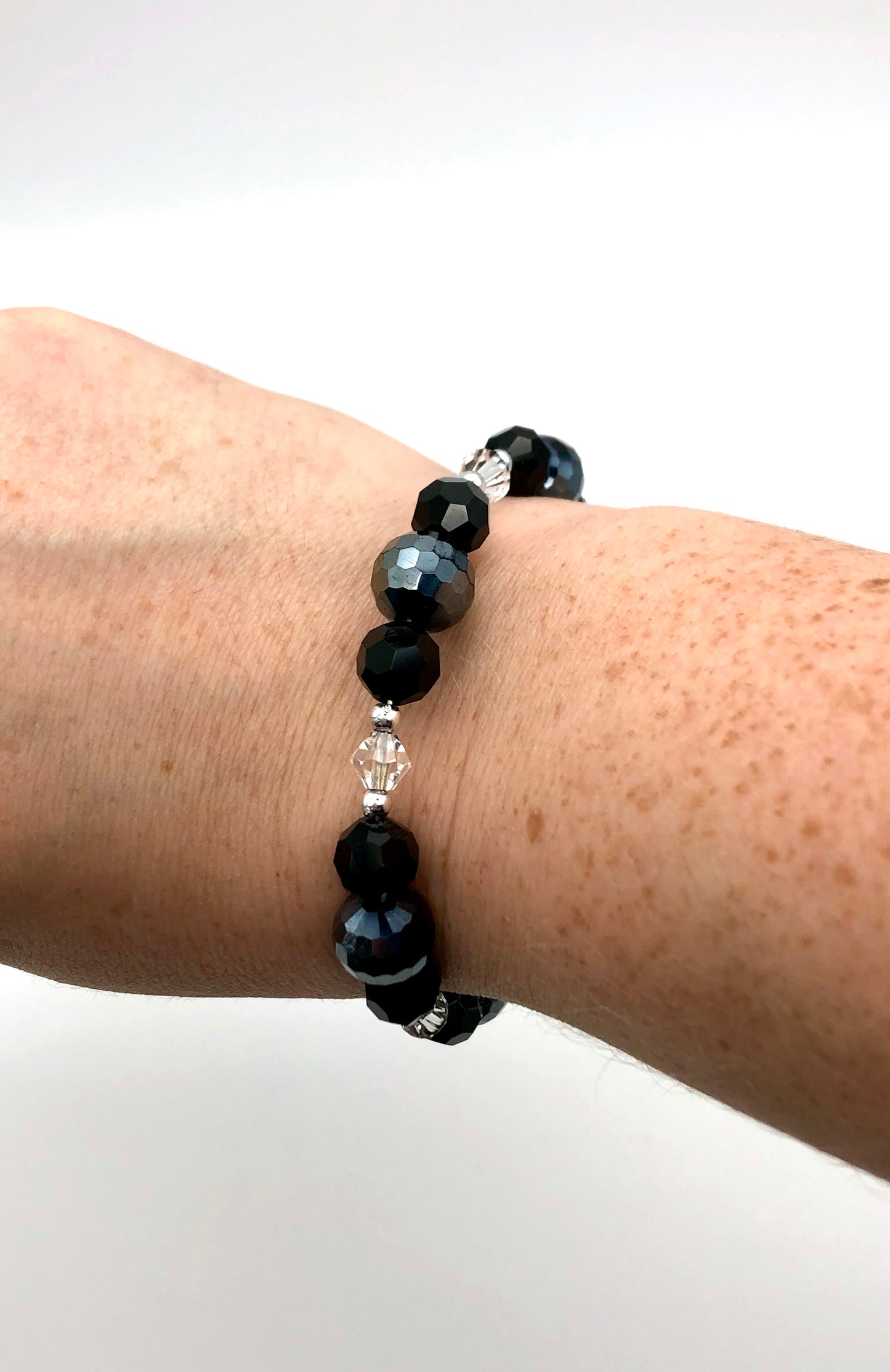 Black, dark disco grey, and crystal beaded silver memory wire bracelet