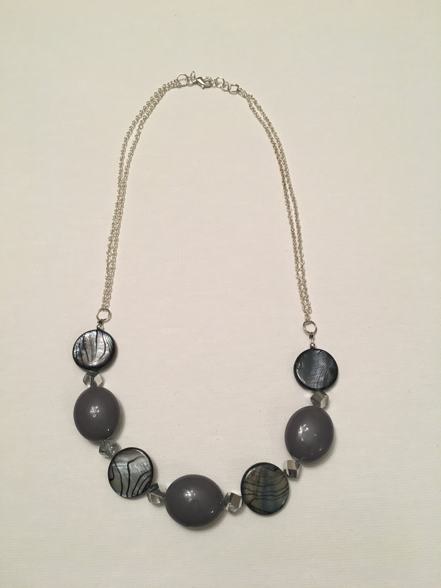 Grey bead and blue-grey shell silver chain necklace
