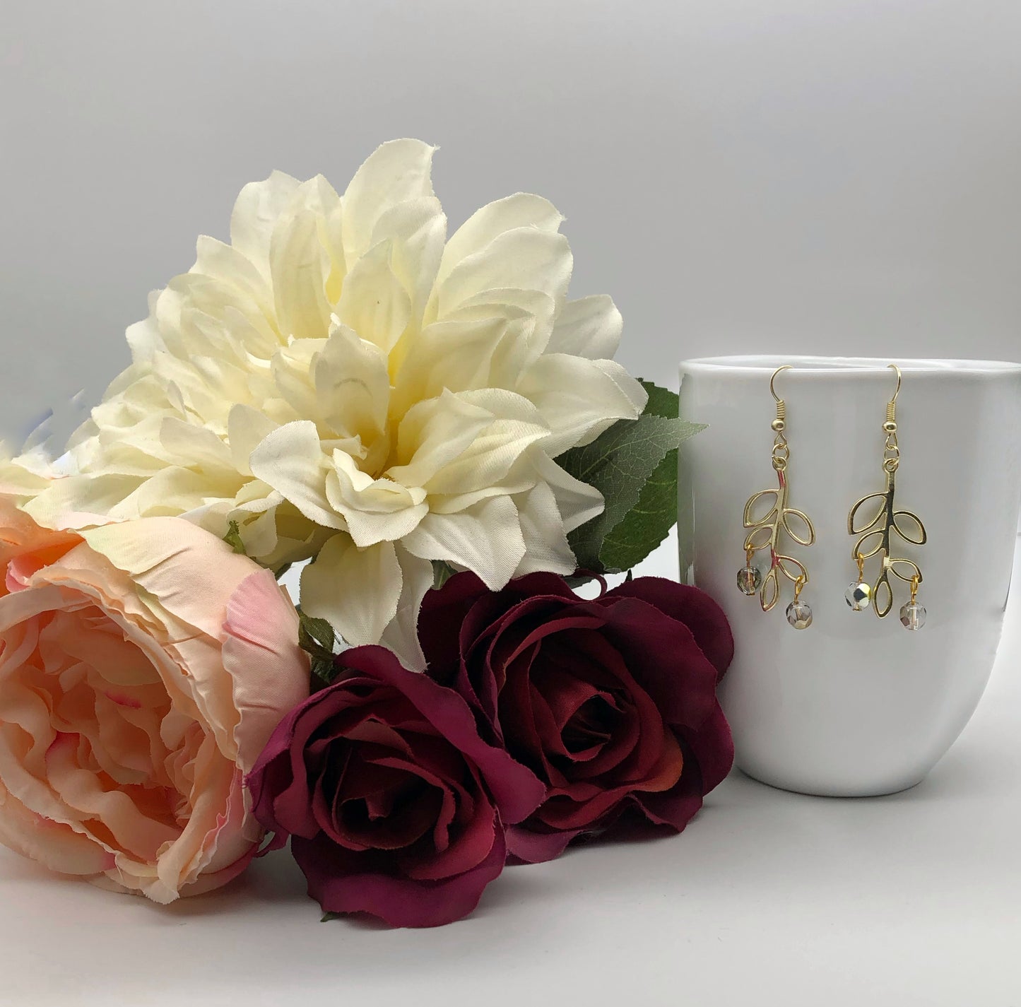 Gold branch with amber bead detail earrings