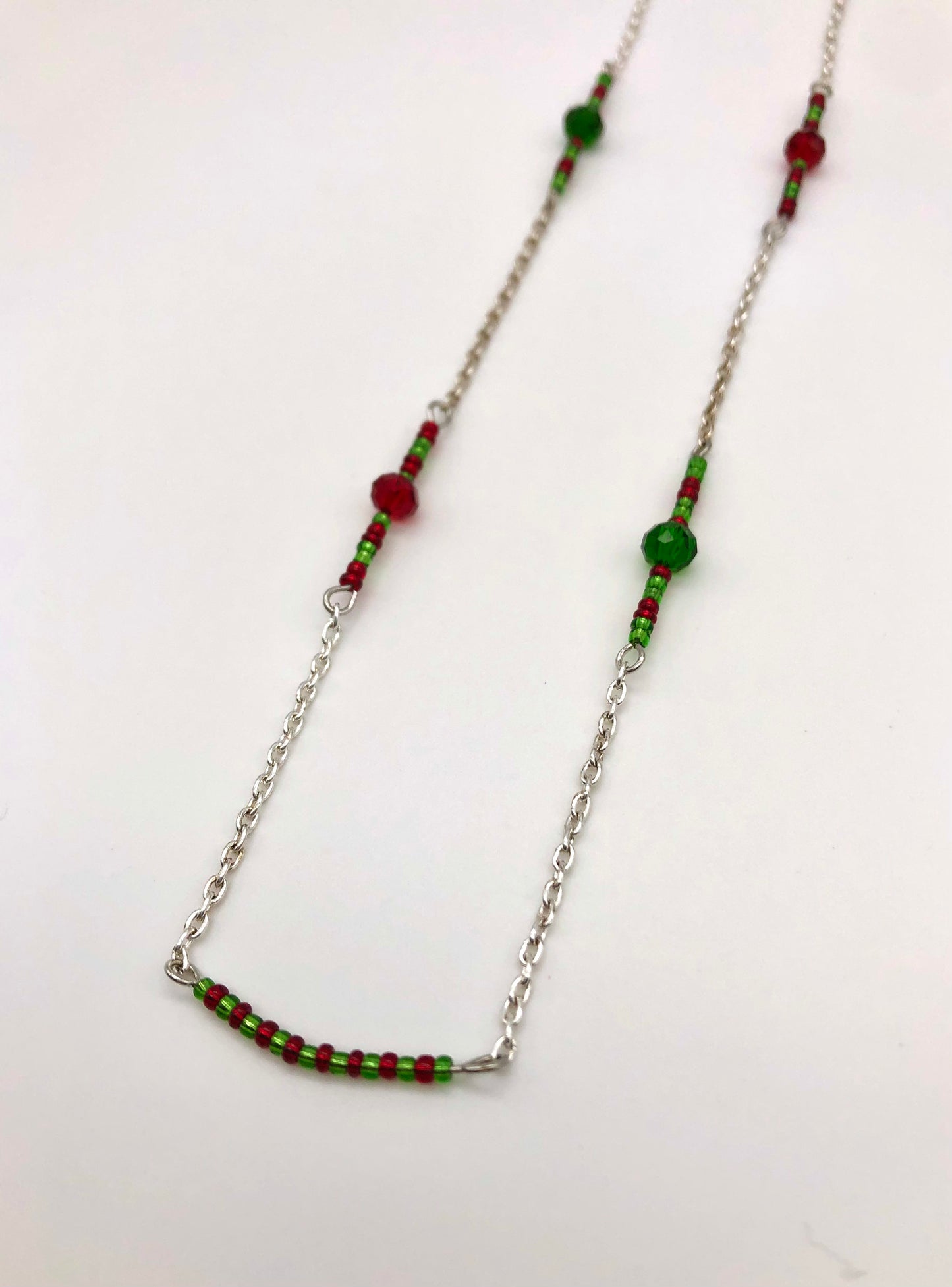 Silver cable chain with red and green seed bead accent necklace