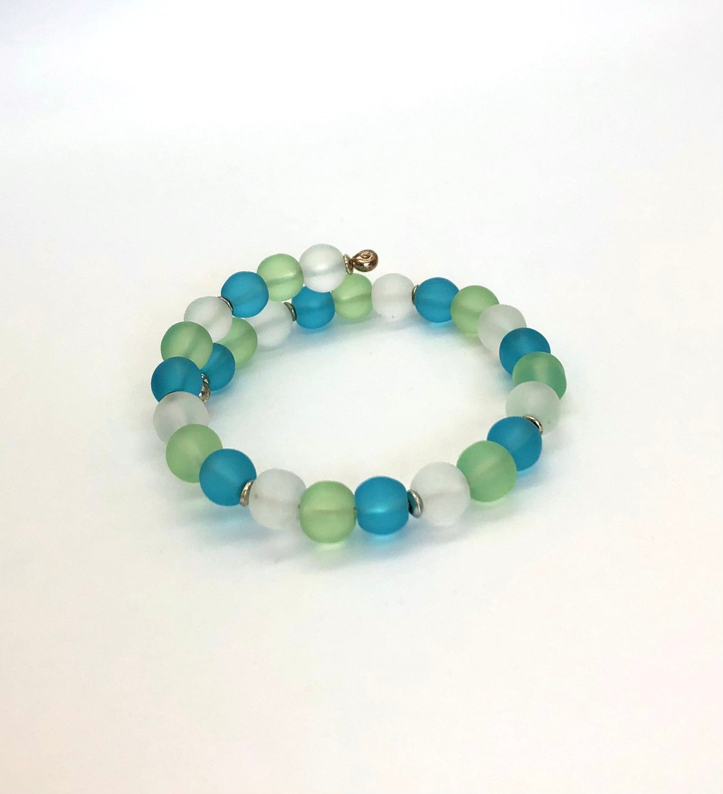 Aqua, light green, and white frosted beads memory wire bracelet