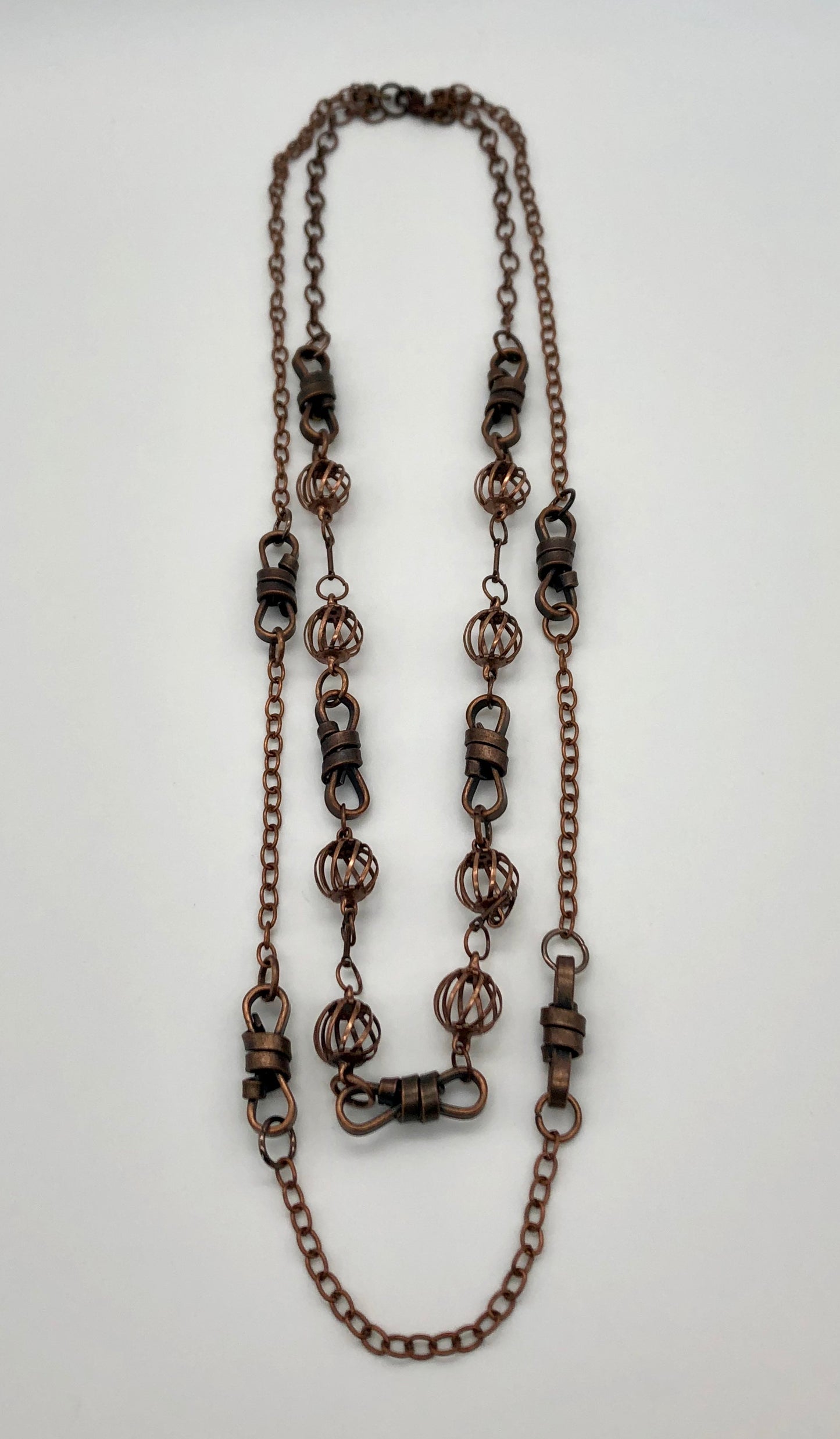 Oxidized copper two-strand chain with rope and curve ball detail necklace