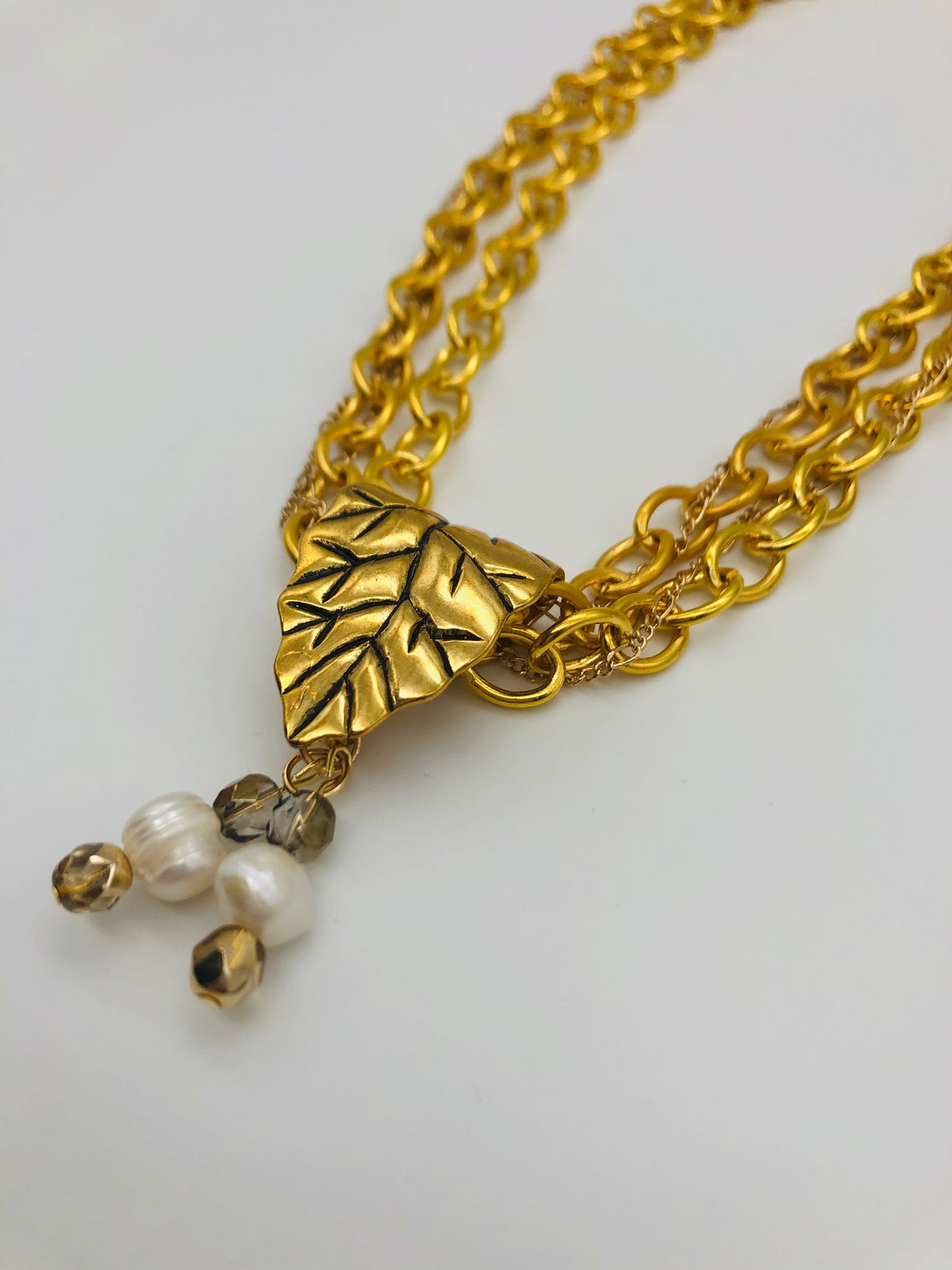 Gold plated large chain with leaf bail and freshwater pearl glass bead detail necklace