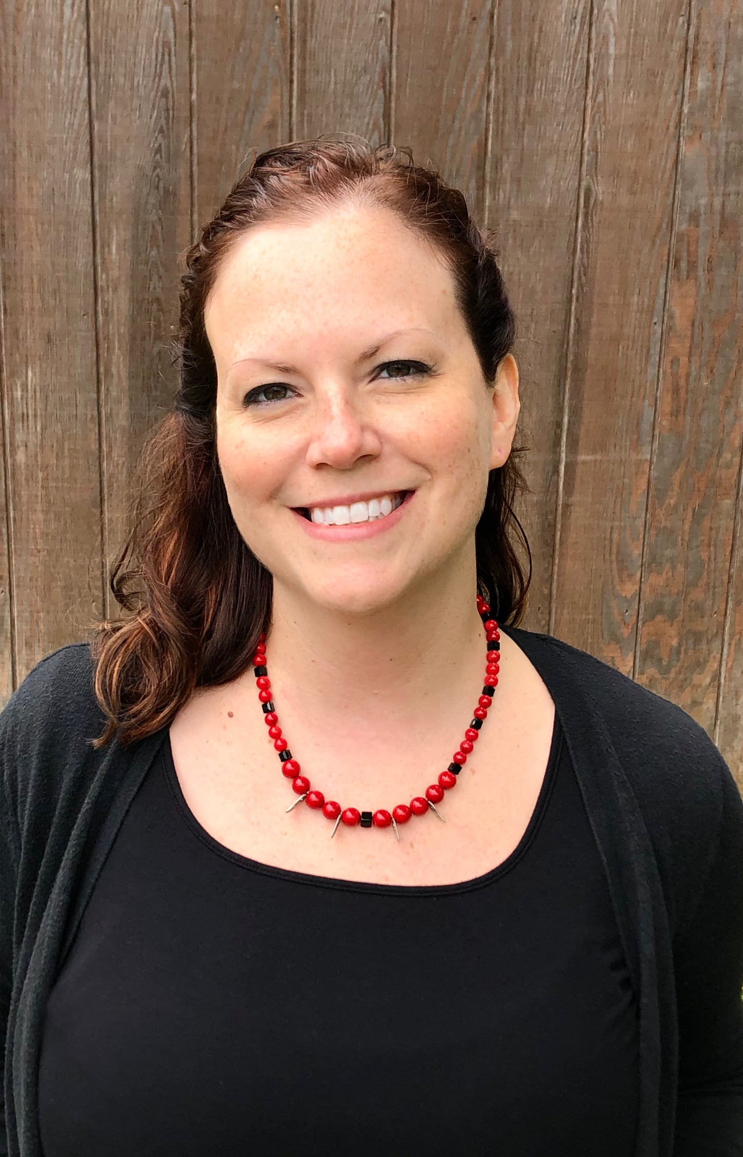 Red round stone and black faceted bead with leaf detail necklace