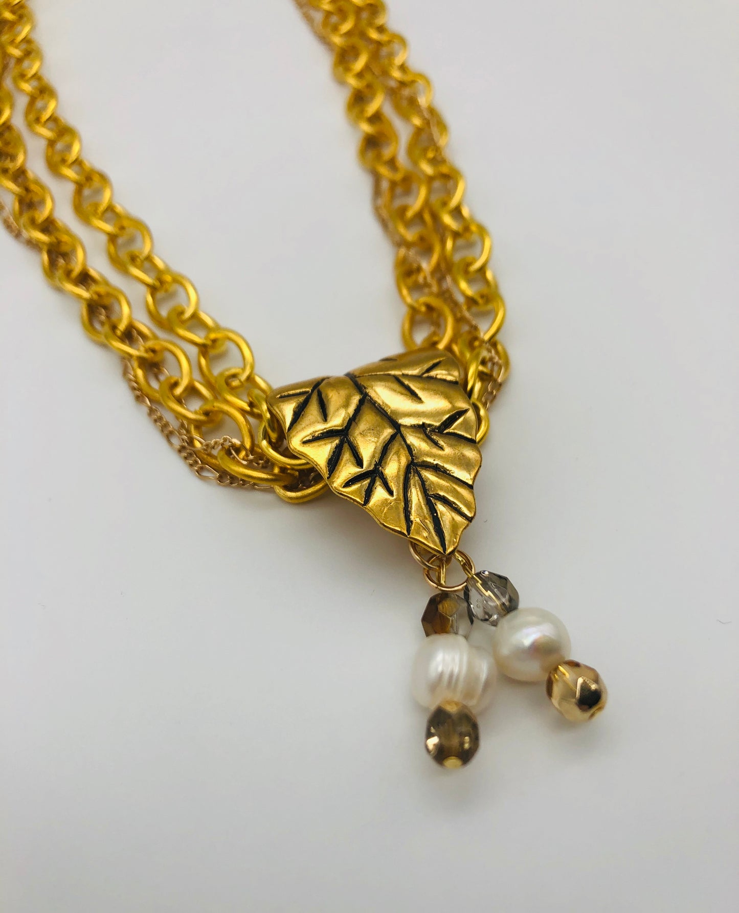 Gold plated large chain with leaf bail and freshwater pearl glass bead detail necklace