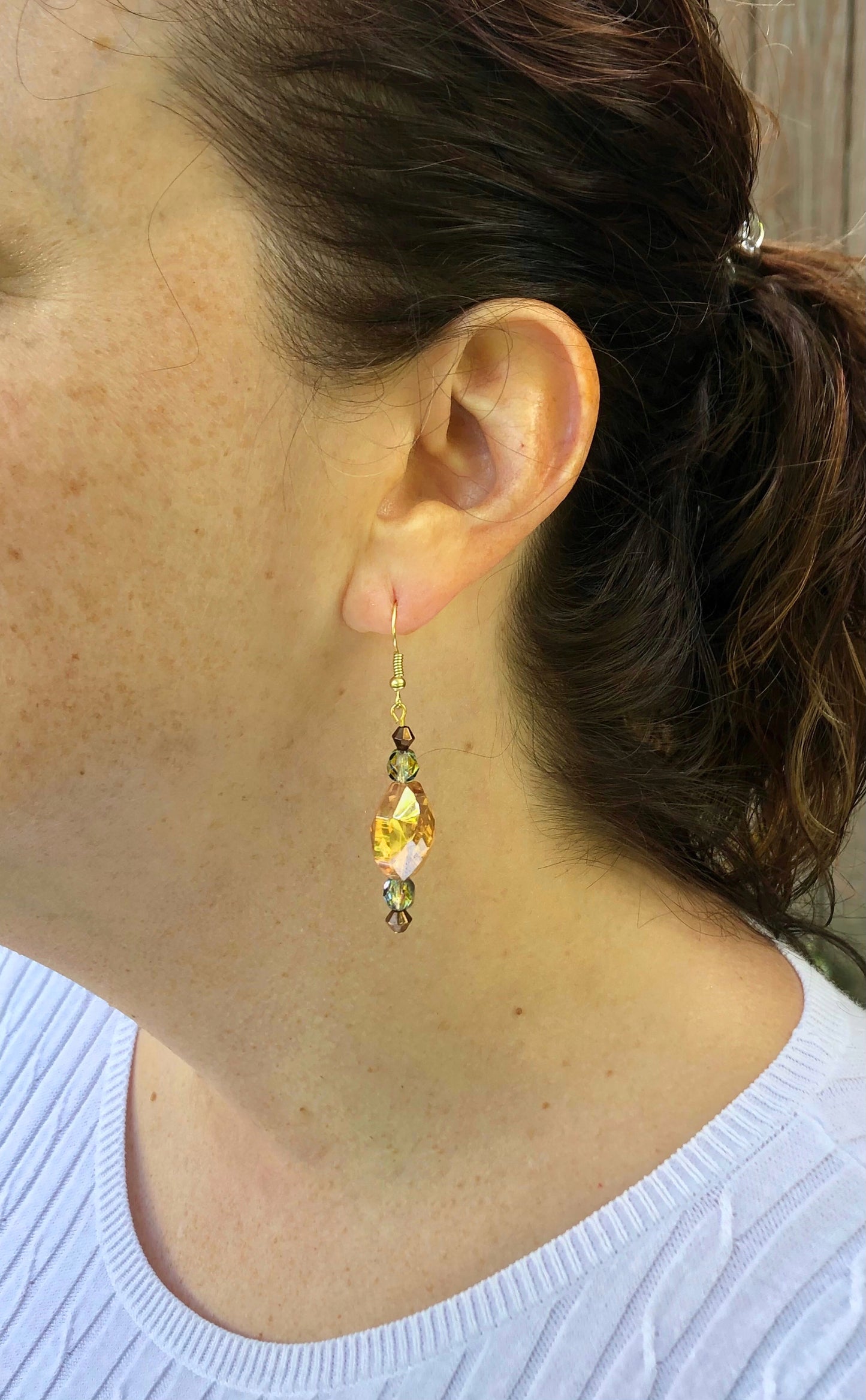 Gold crystal and amber-colored beaded earrings