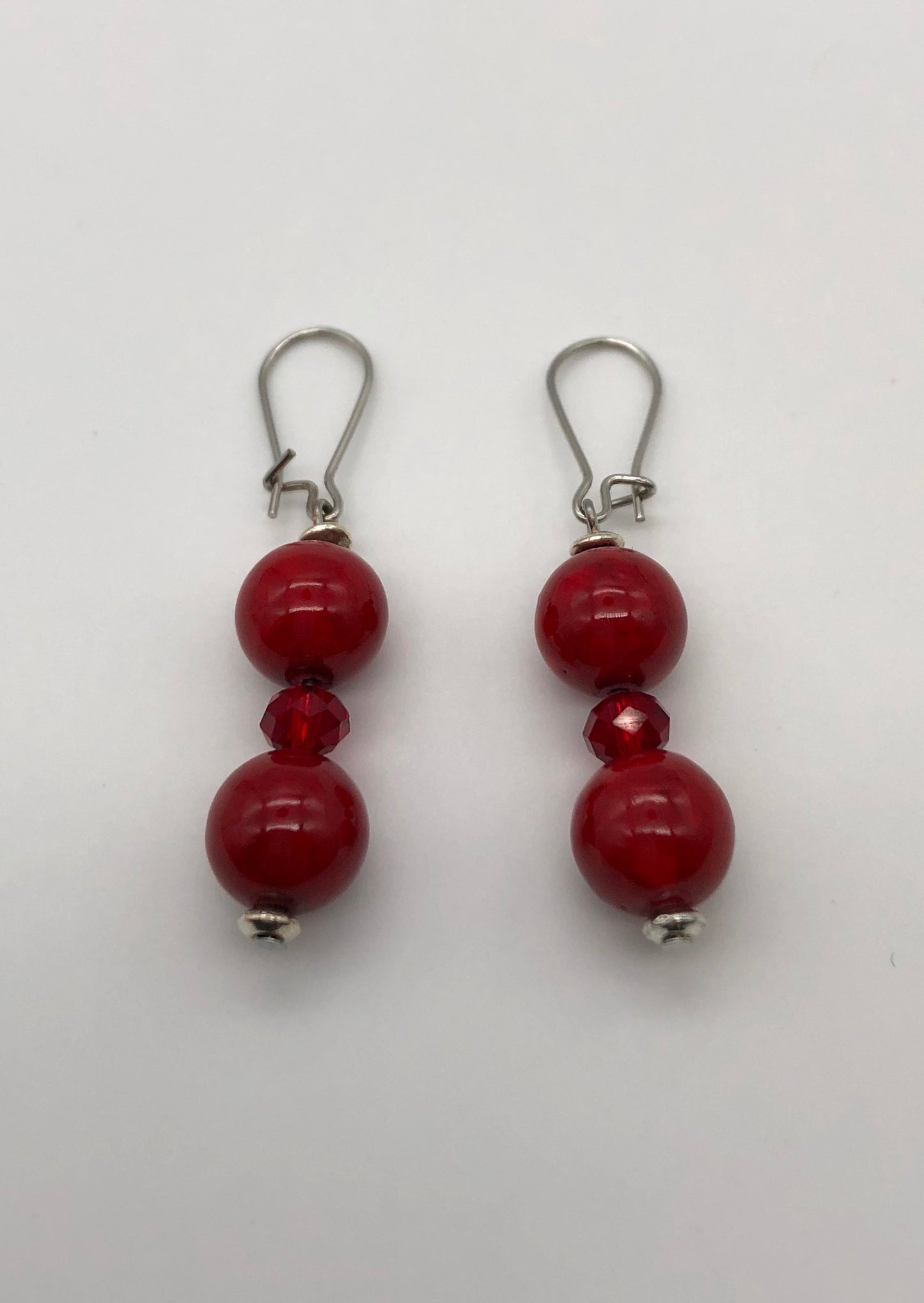 Red round stone and faceted beaded earrings