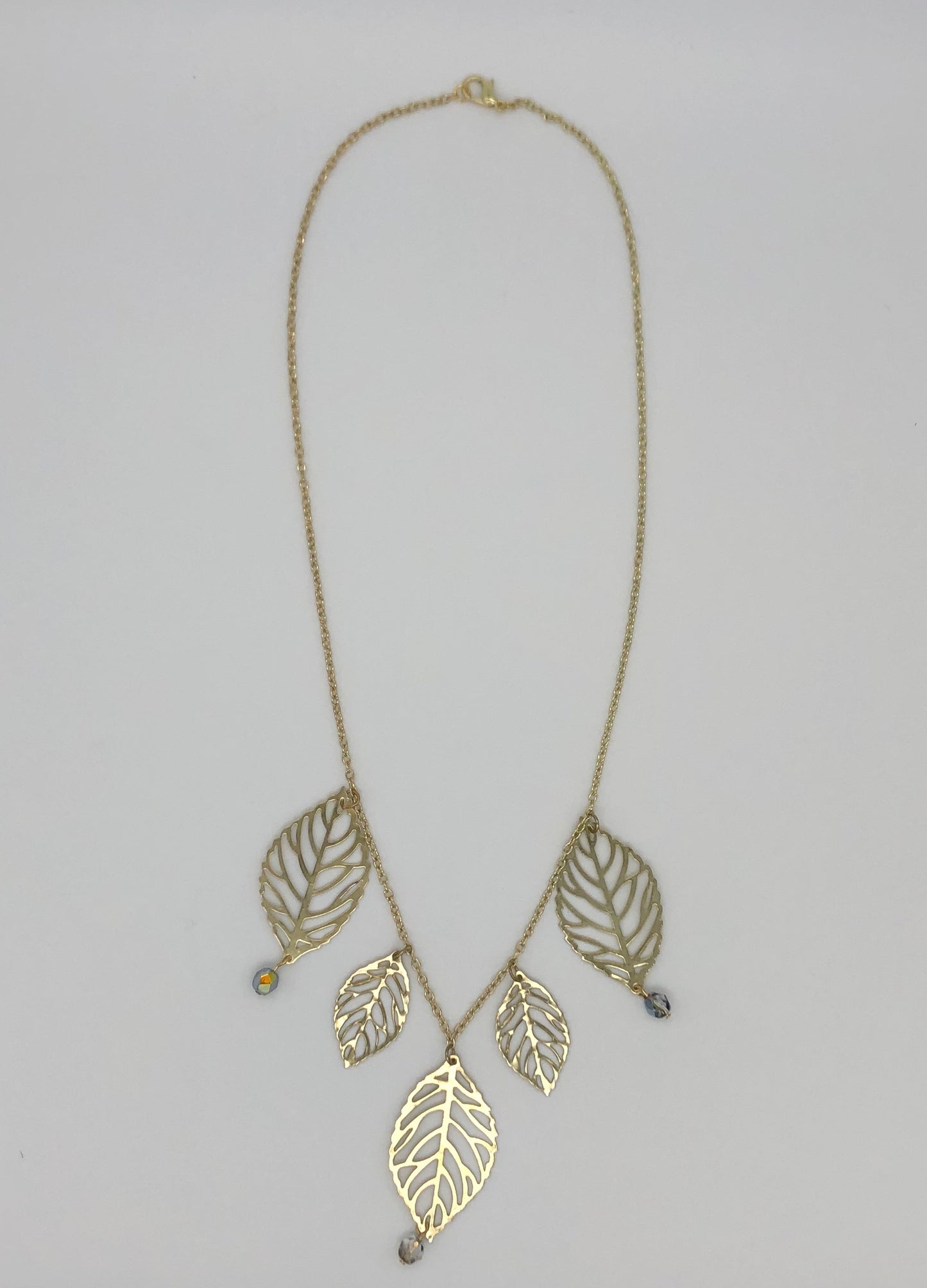 Gold plated leaf cutout dangles chain necklace
