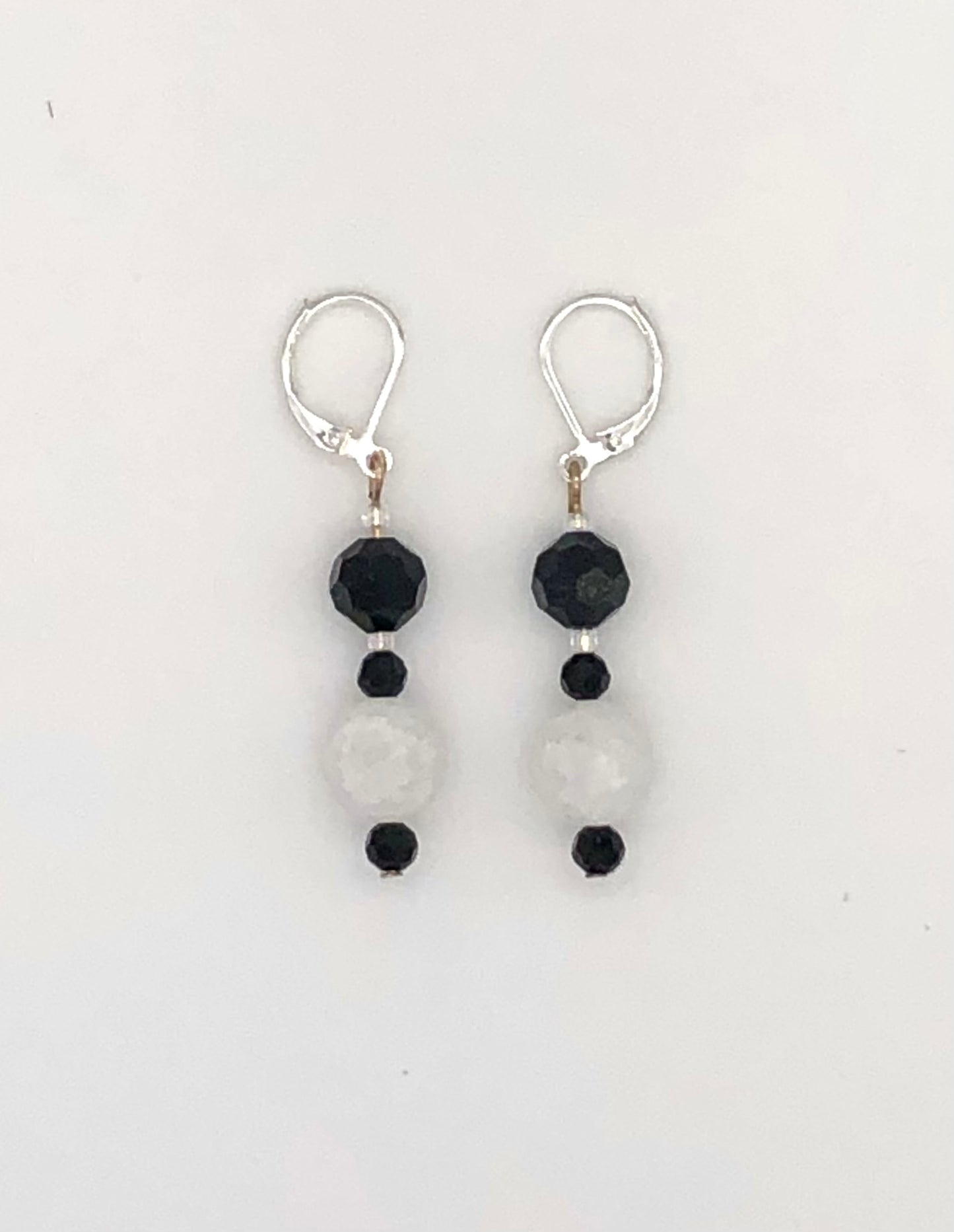 Black faceted and white crackle bead earrings