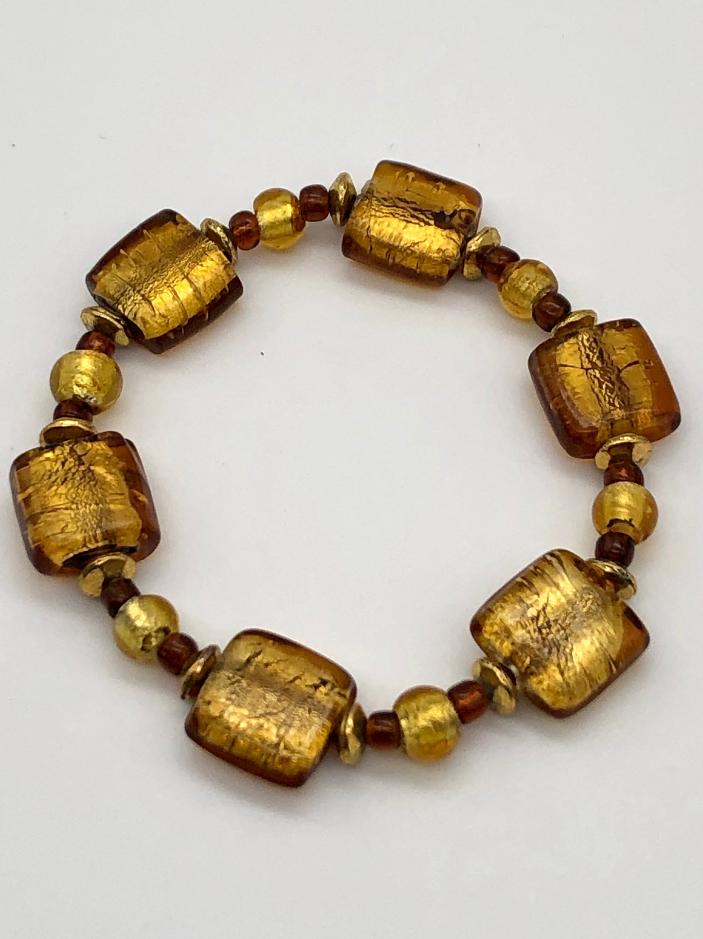 Gold foil and topaz lampwork bead stretch bracelet