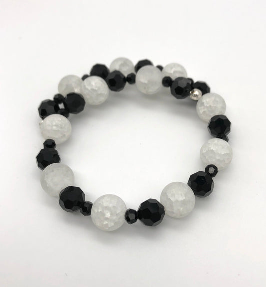 Black faceted bead and white crackle bead memory wire bracelet