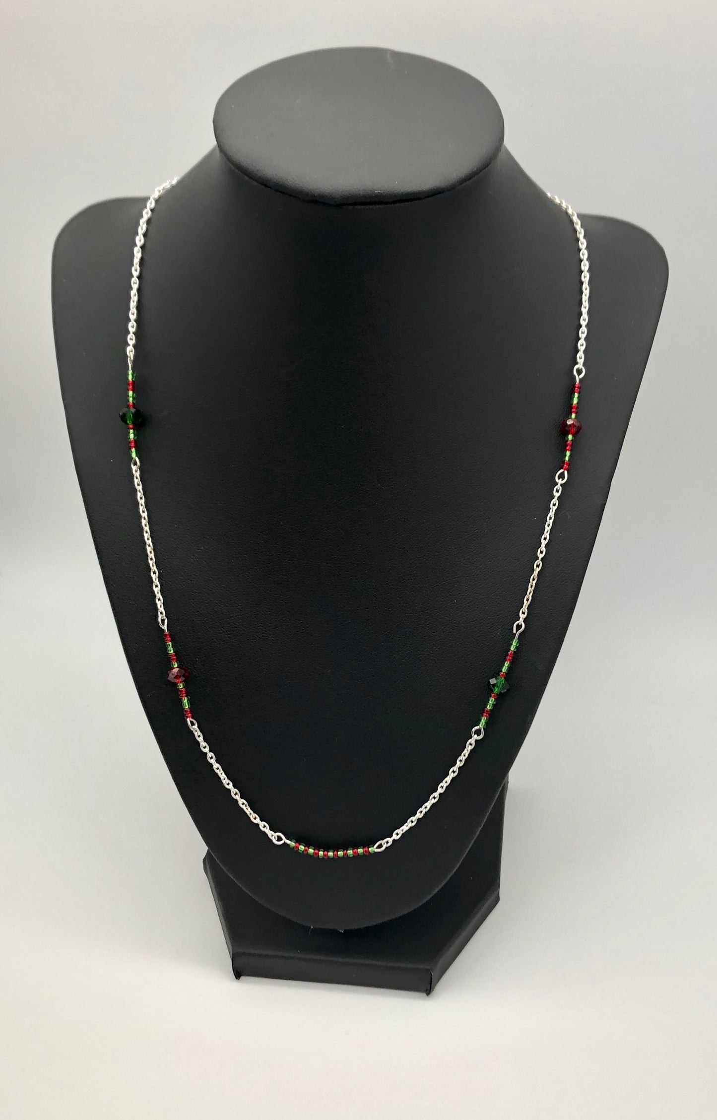 Silver cable chain with red and green seed bead accent necklace