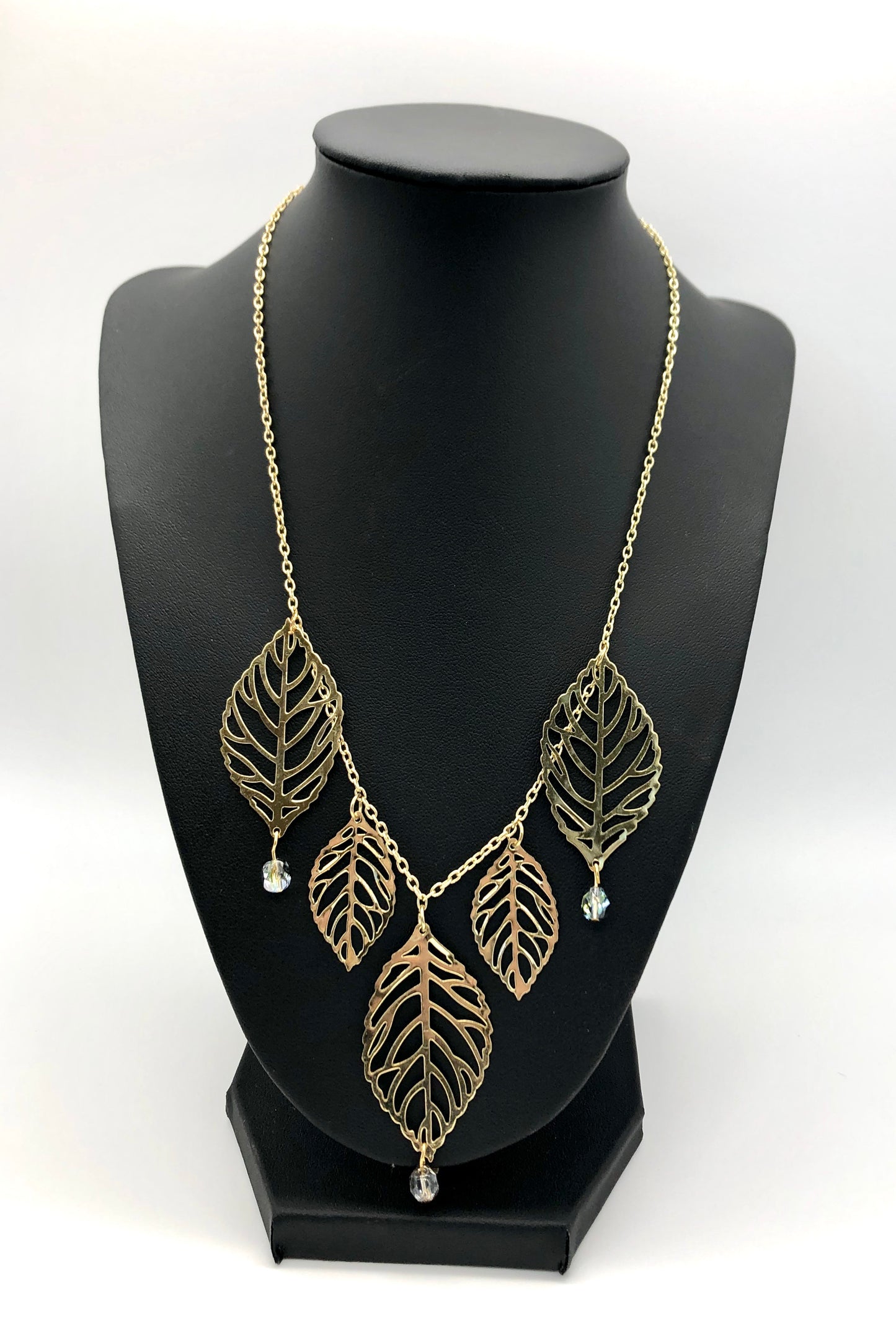 Gold plated leaf cutout dangles chain necklace