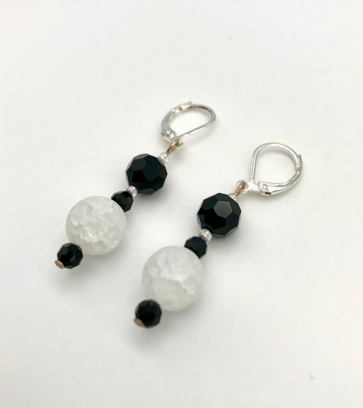 Black faceted and white crackle bead earrings