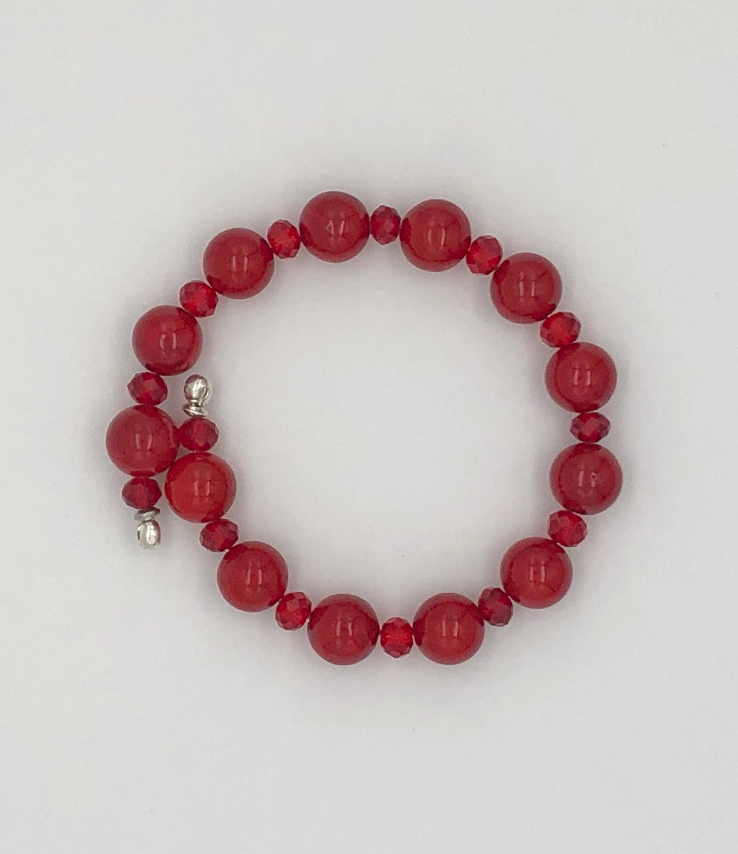 Red round stone and faceted beaded memory wire bracelet