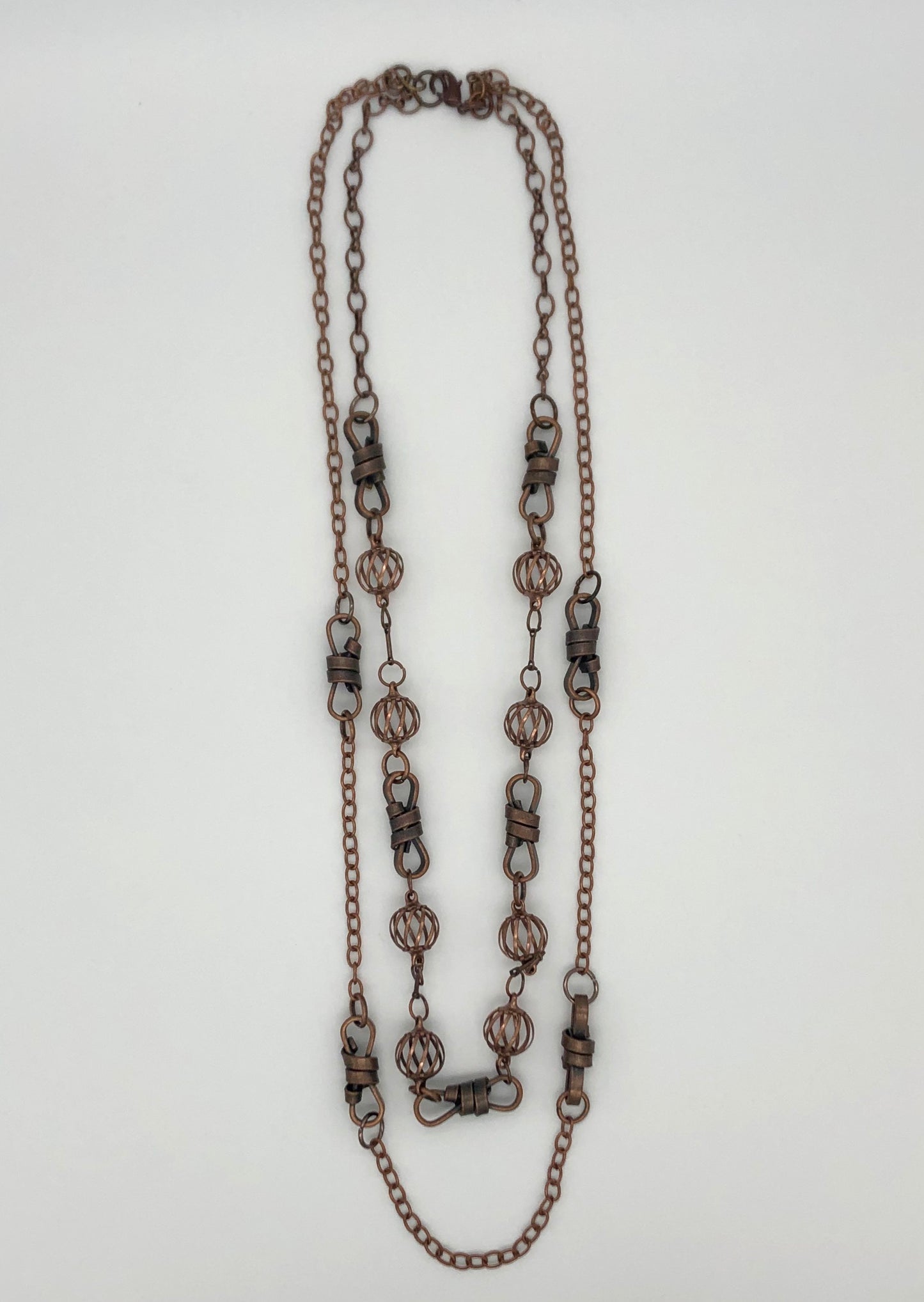Oxidized copper two-strand chain with rope and curve ball detail necklace