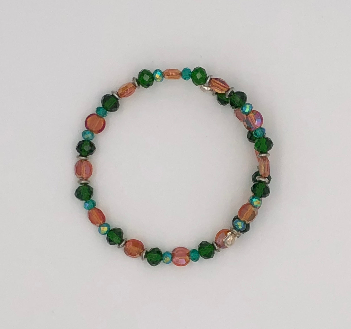 Orange lentil and green faceted beaded memory wire bracelet