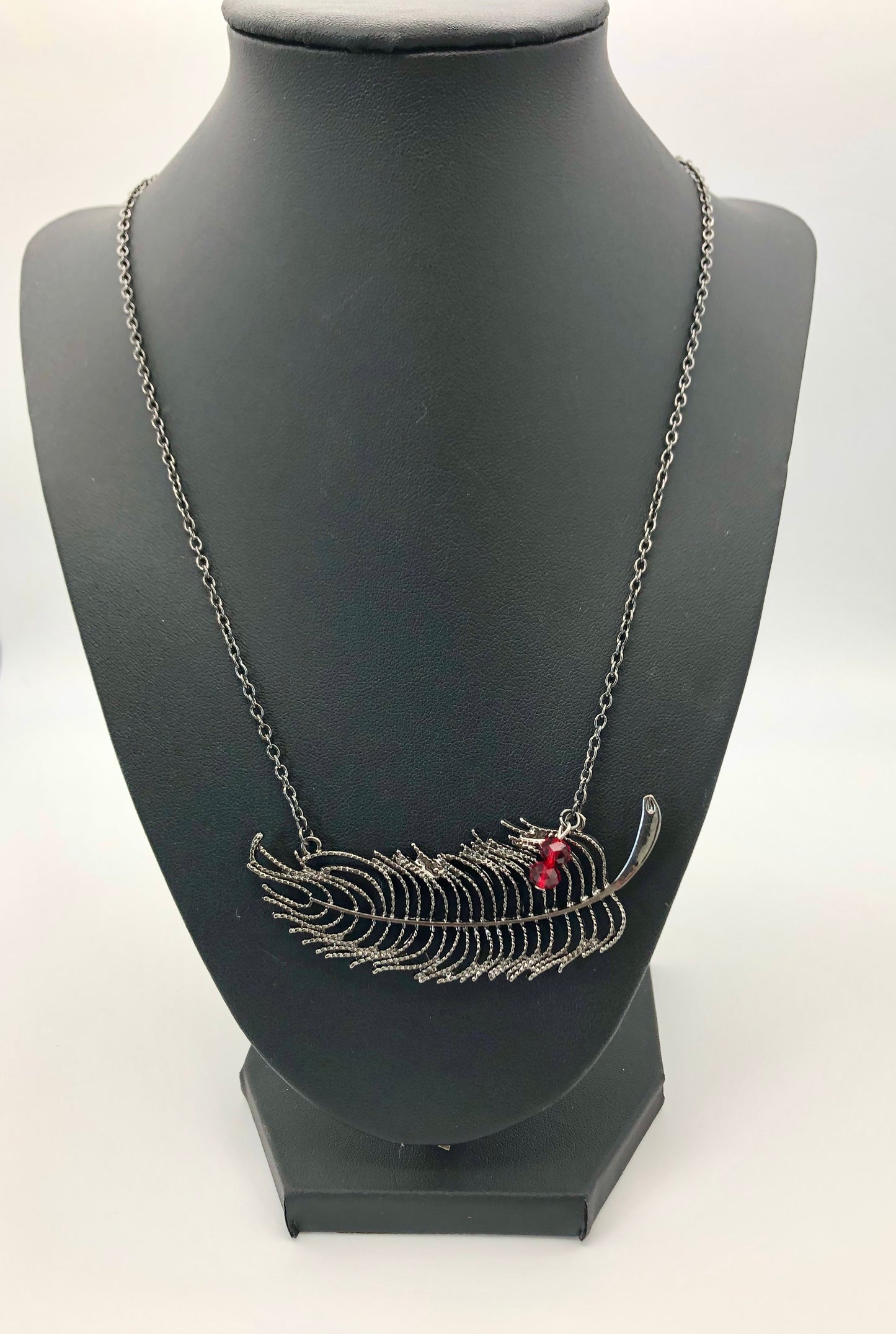 Feather necklace with red bead accents