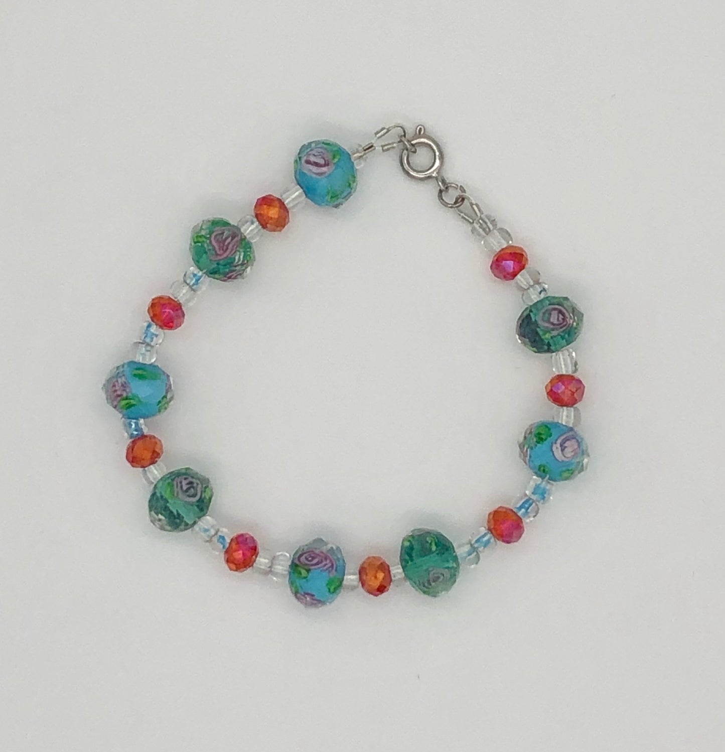 Lampwork blue and pink bead with rose detail bracelet