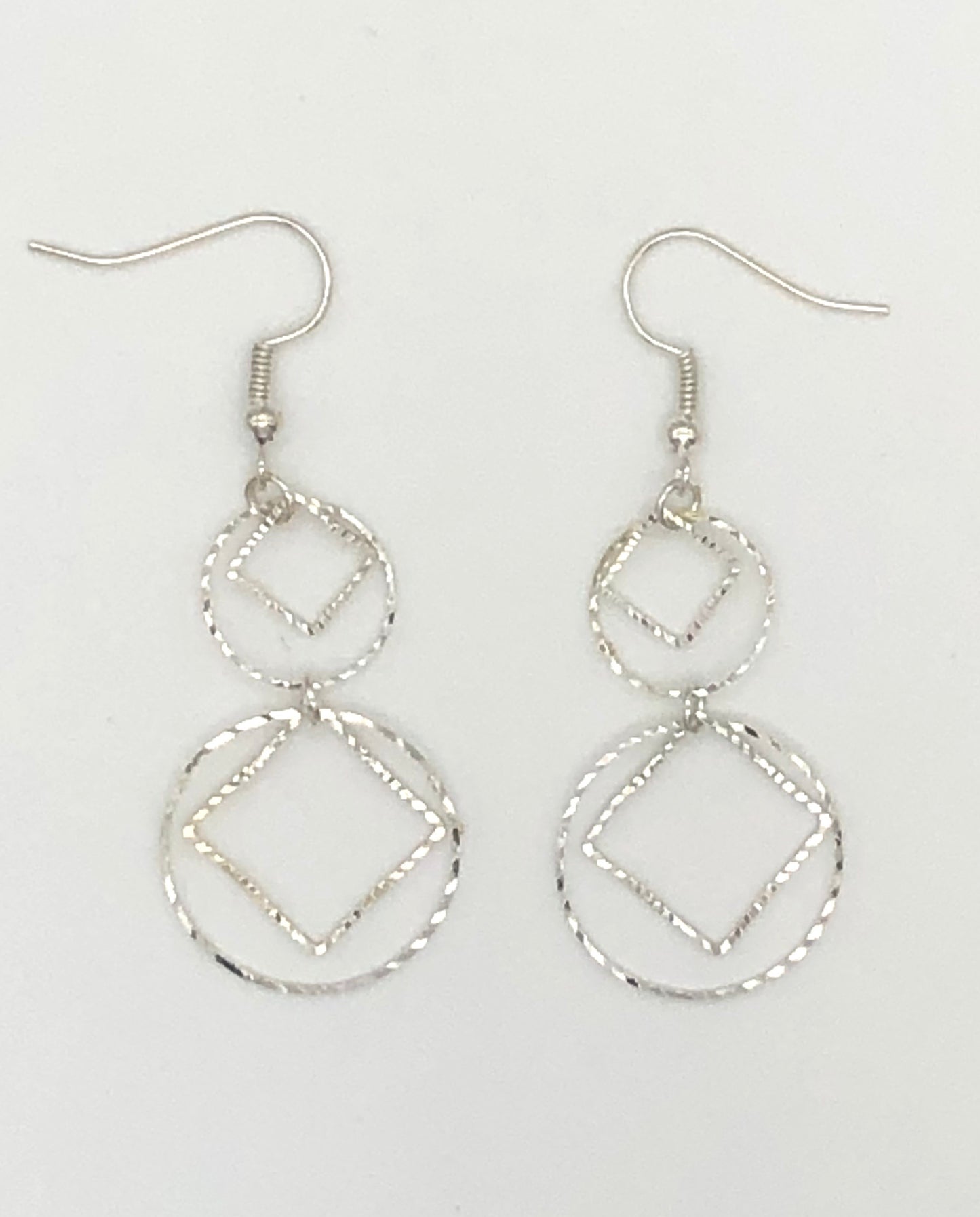 Diamond and circle cutouts drop earrings