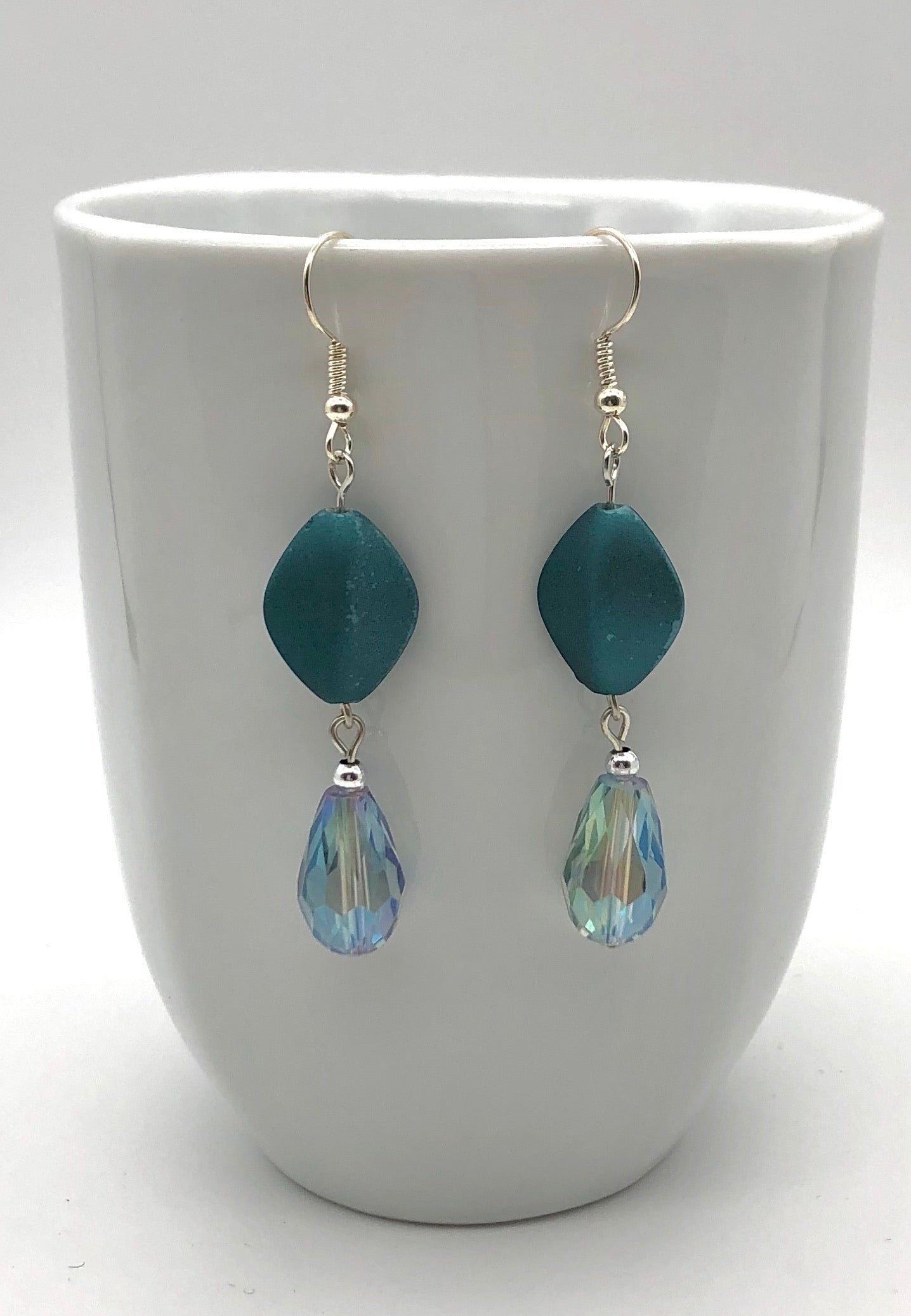 Teal matte oval bead and iris blue teardrop bead earrings