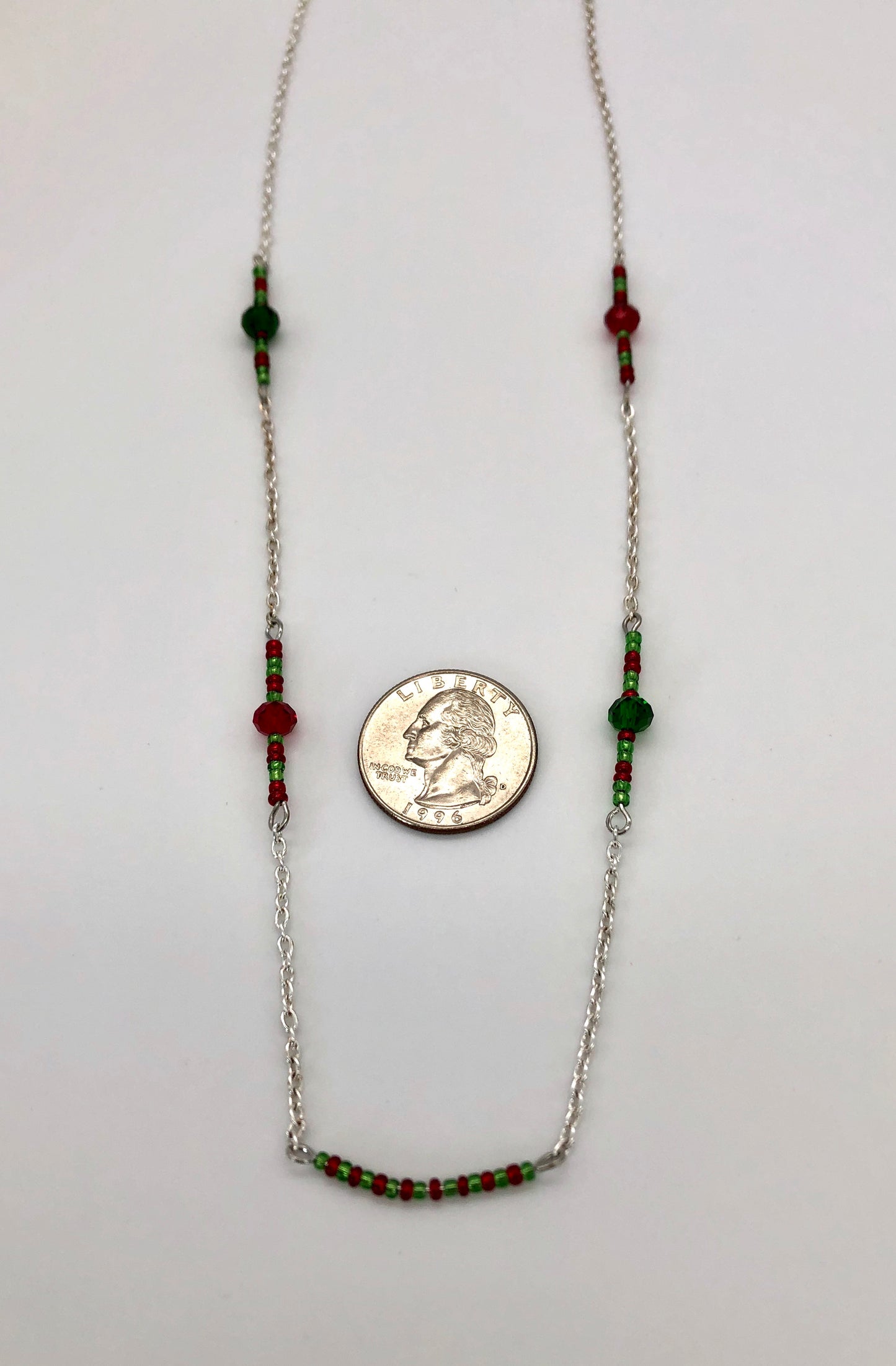 Silver cable chain with red and green seed bead accent necklace