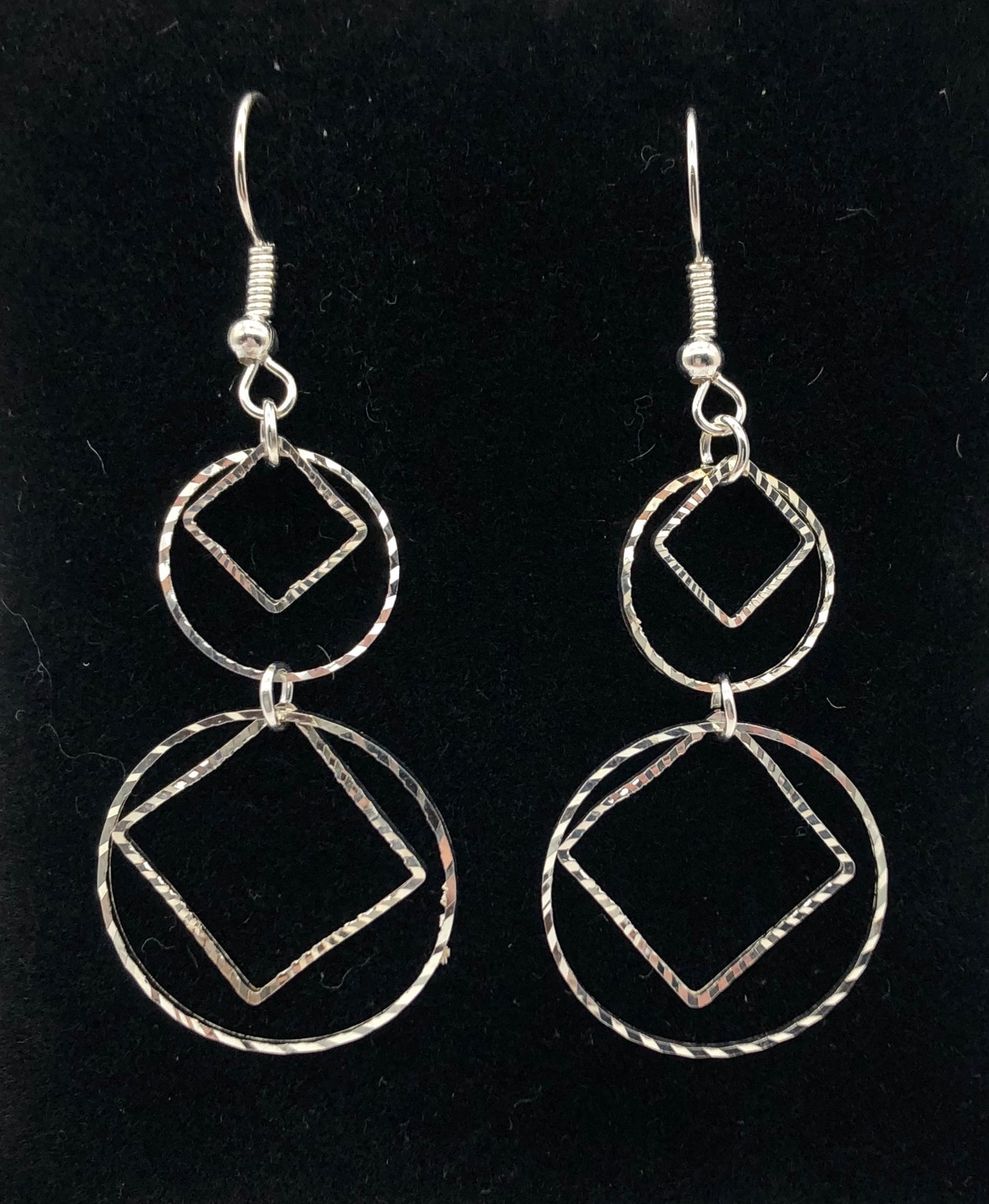 Diamond and circle cutouts drop earrings