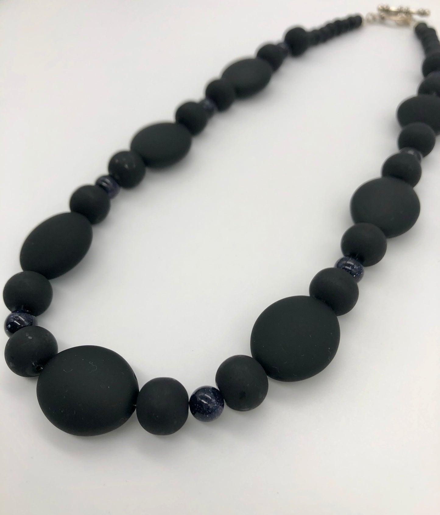 Matte black oval and black stone sparkle beaded necklace
