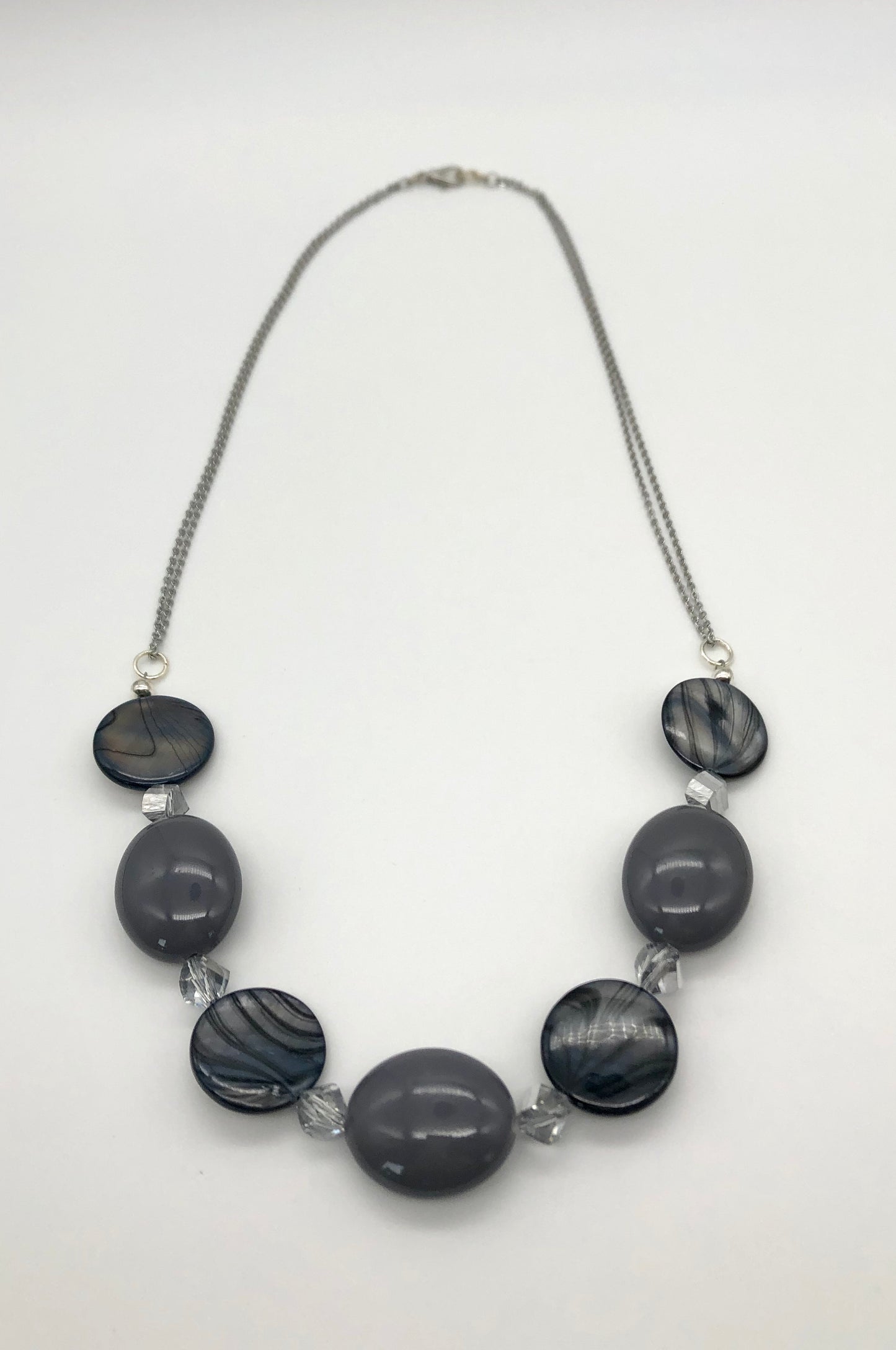 Grey bead and blue-grey shell silver chain necklace