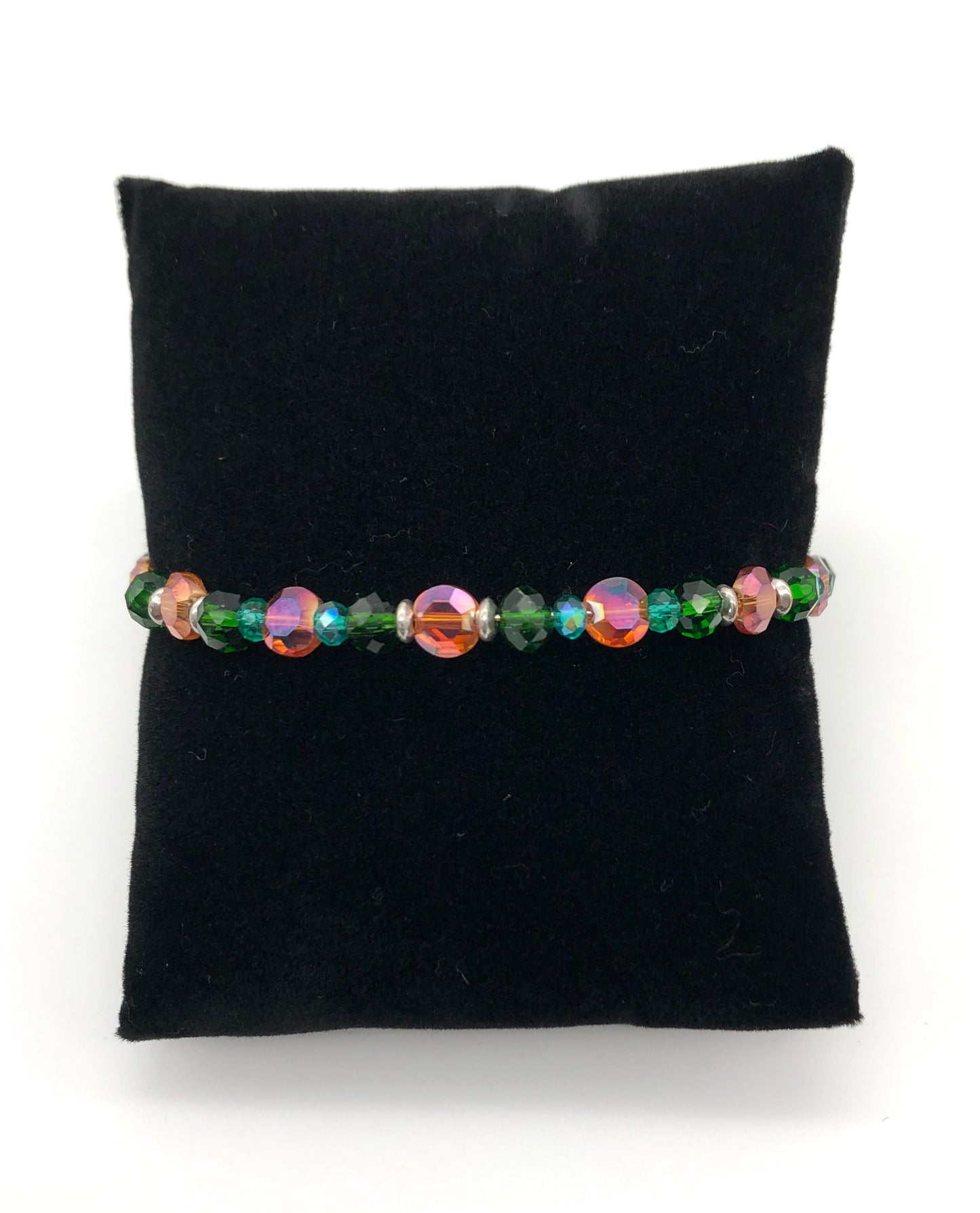 Orange lentil and green faceted beaded memory wire bracelet