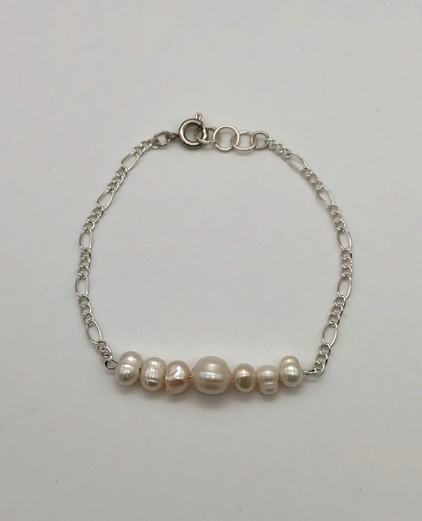 Freshwater pearl silver plated figaro chain bracelet