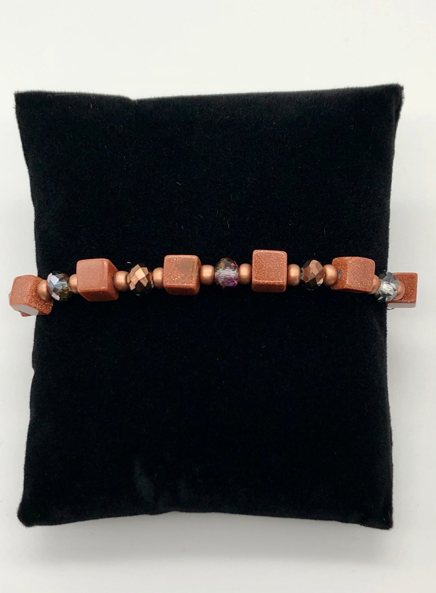 Goldstone and amber bead stretch bracelet