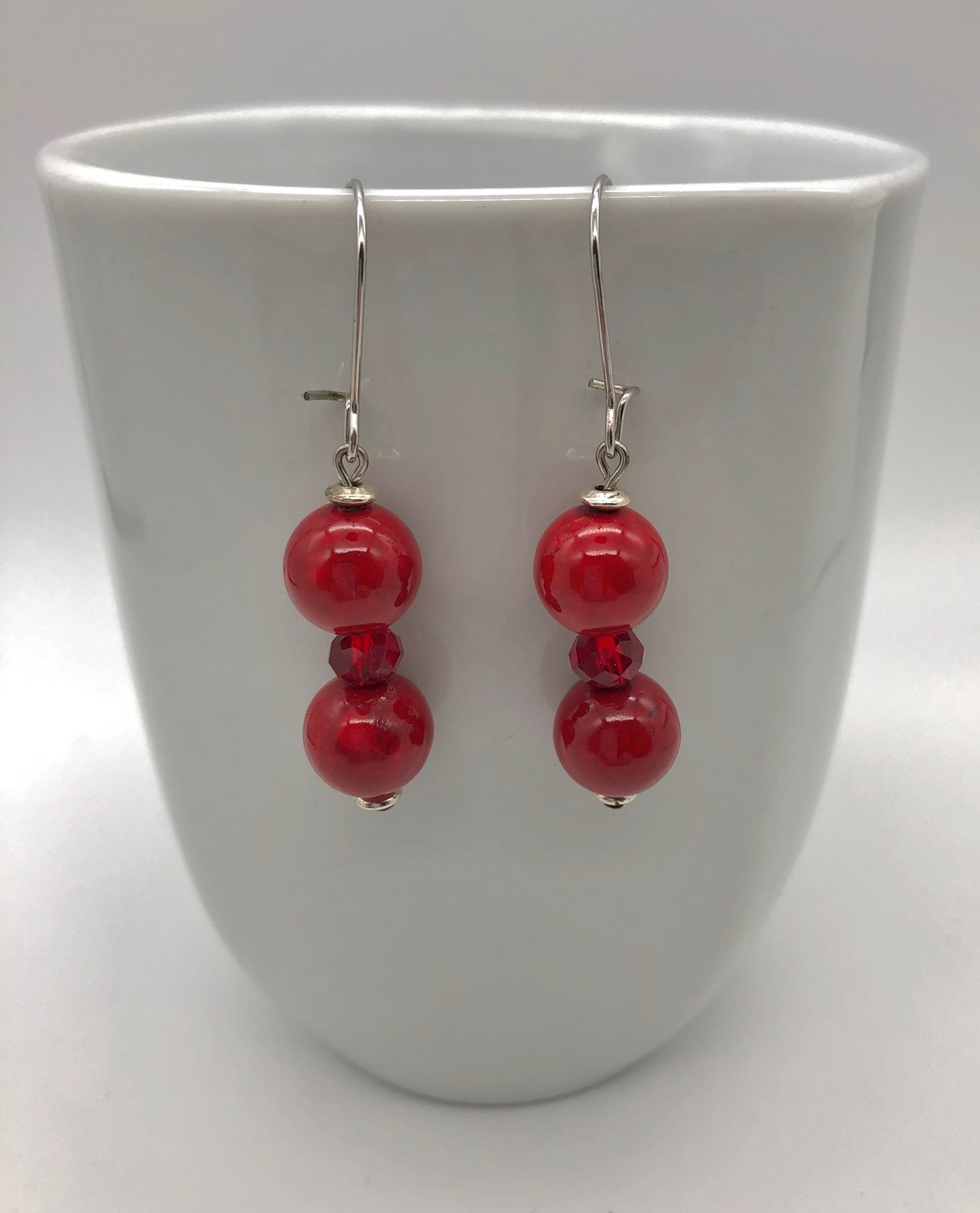 Red round stone and faceted beaded earrings