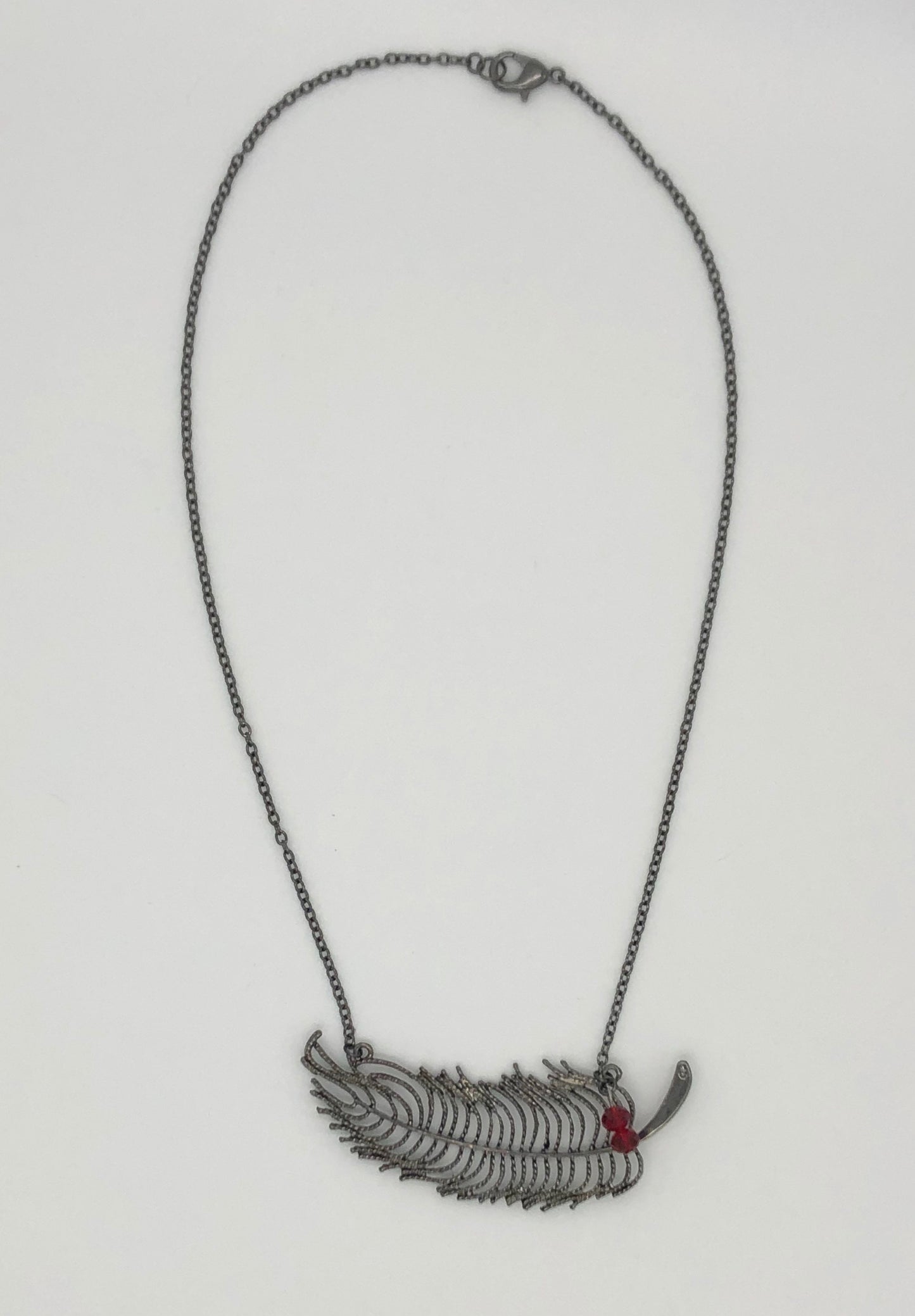 Feather necklace with red bead accents