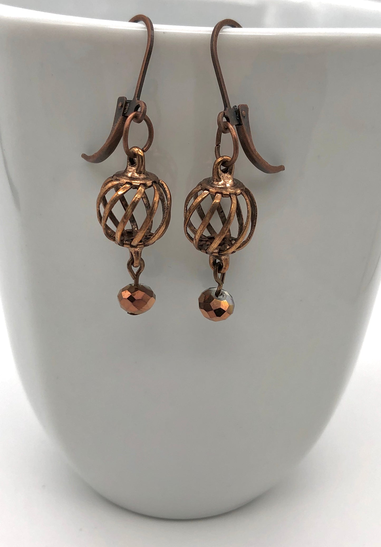 Oxidized copper curve ball earrings