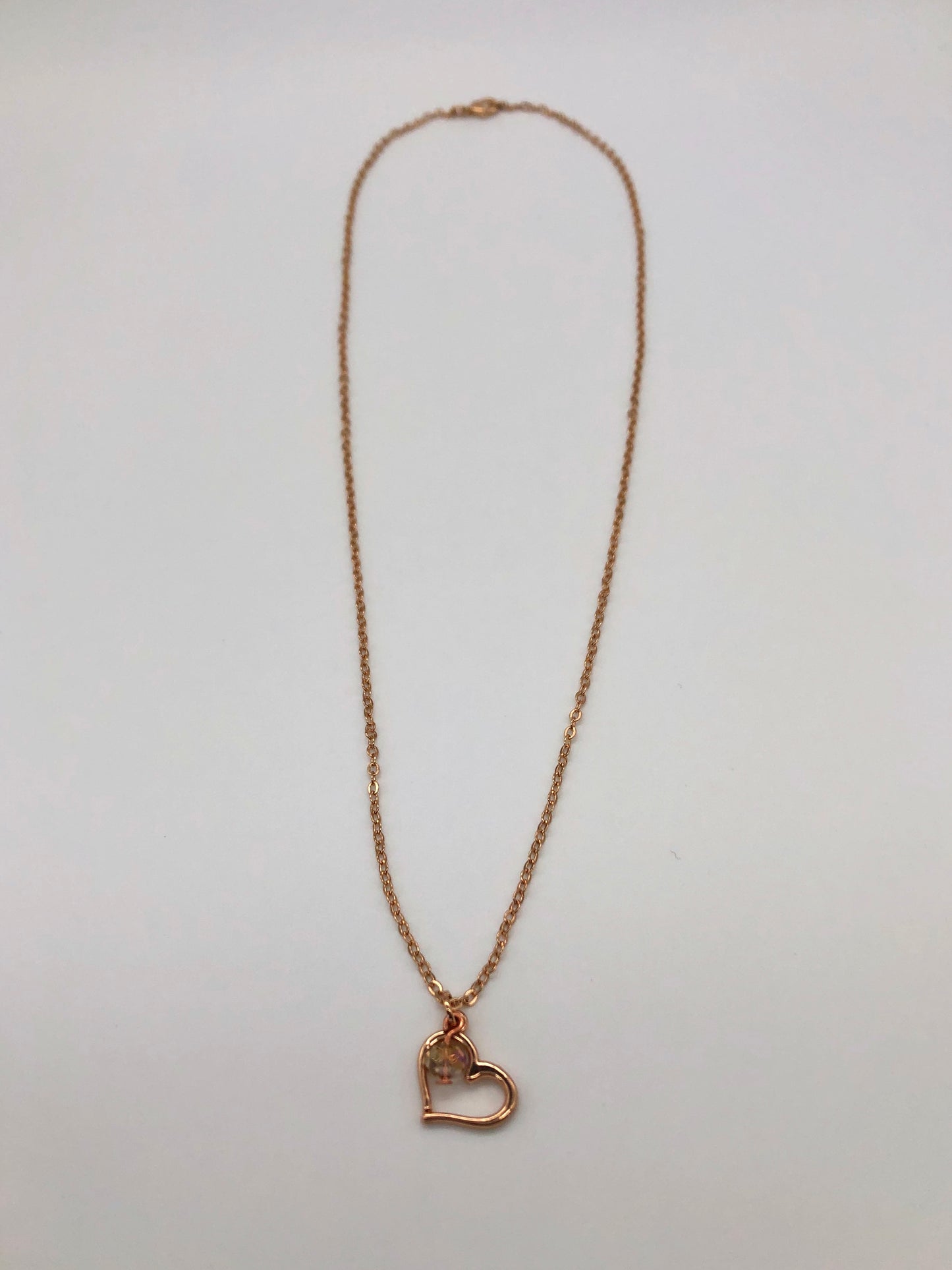 Rose gold plated chain with open heart charm and bead accent necklace