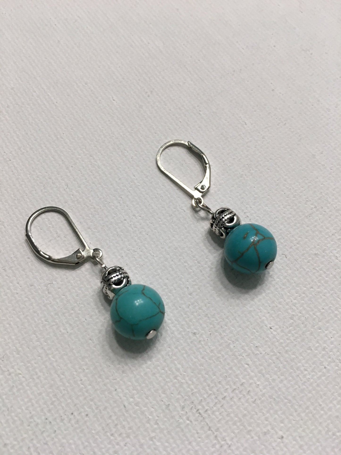 Silver with round turquoise bead earrings