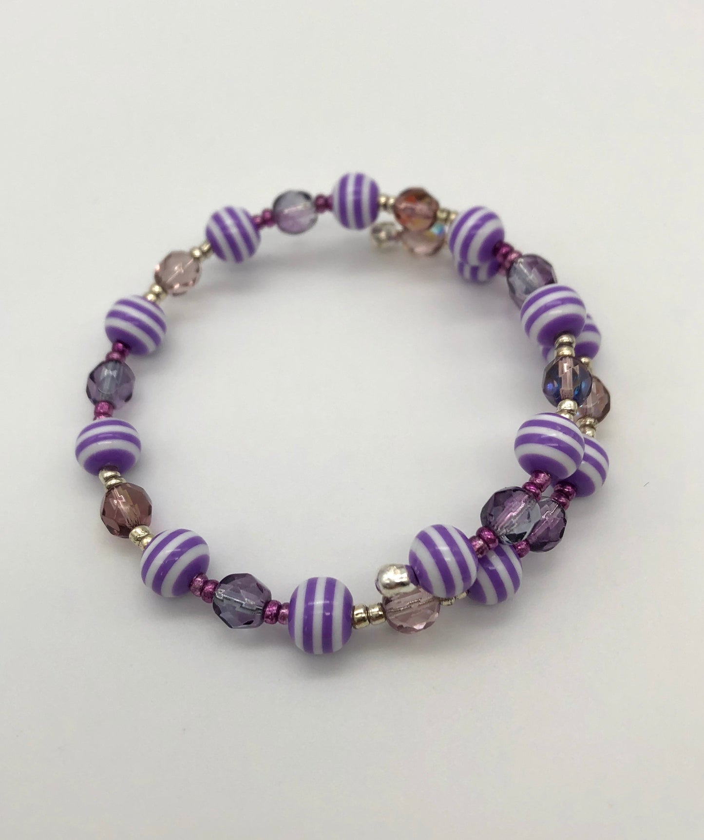 Purple faceted and purple with white stripes memory wire bracelet