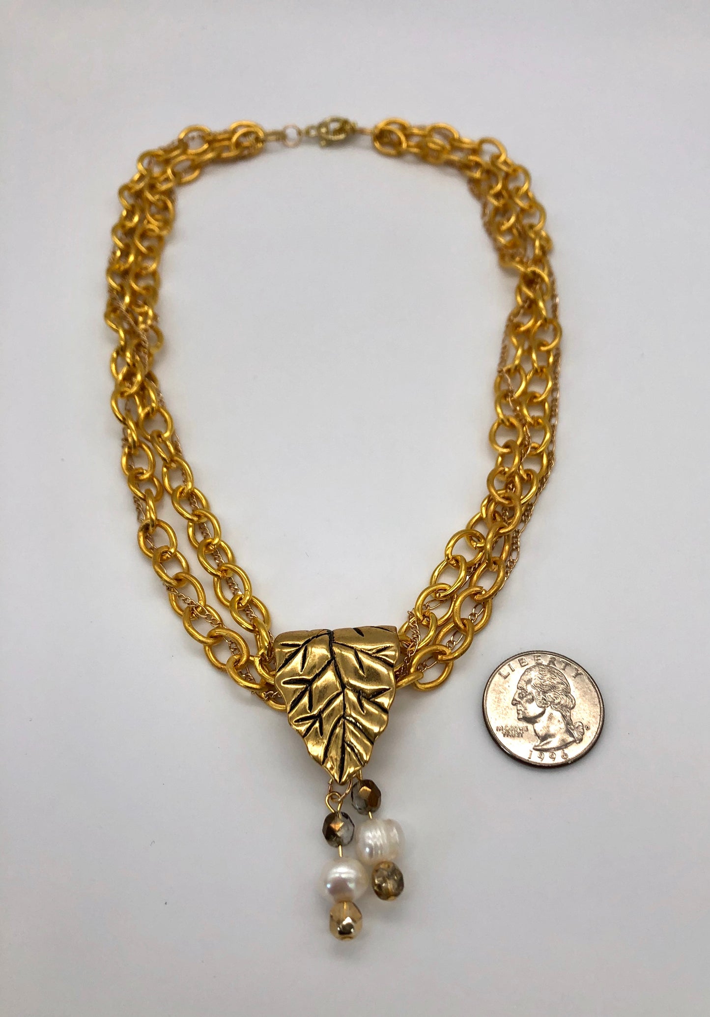 Gold plated large chain with leaf bail and freshwater pearl glass bead detail necklace