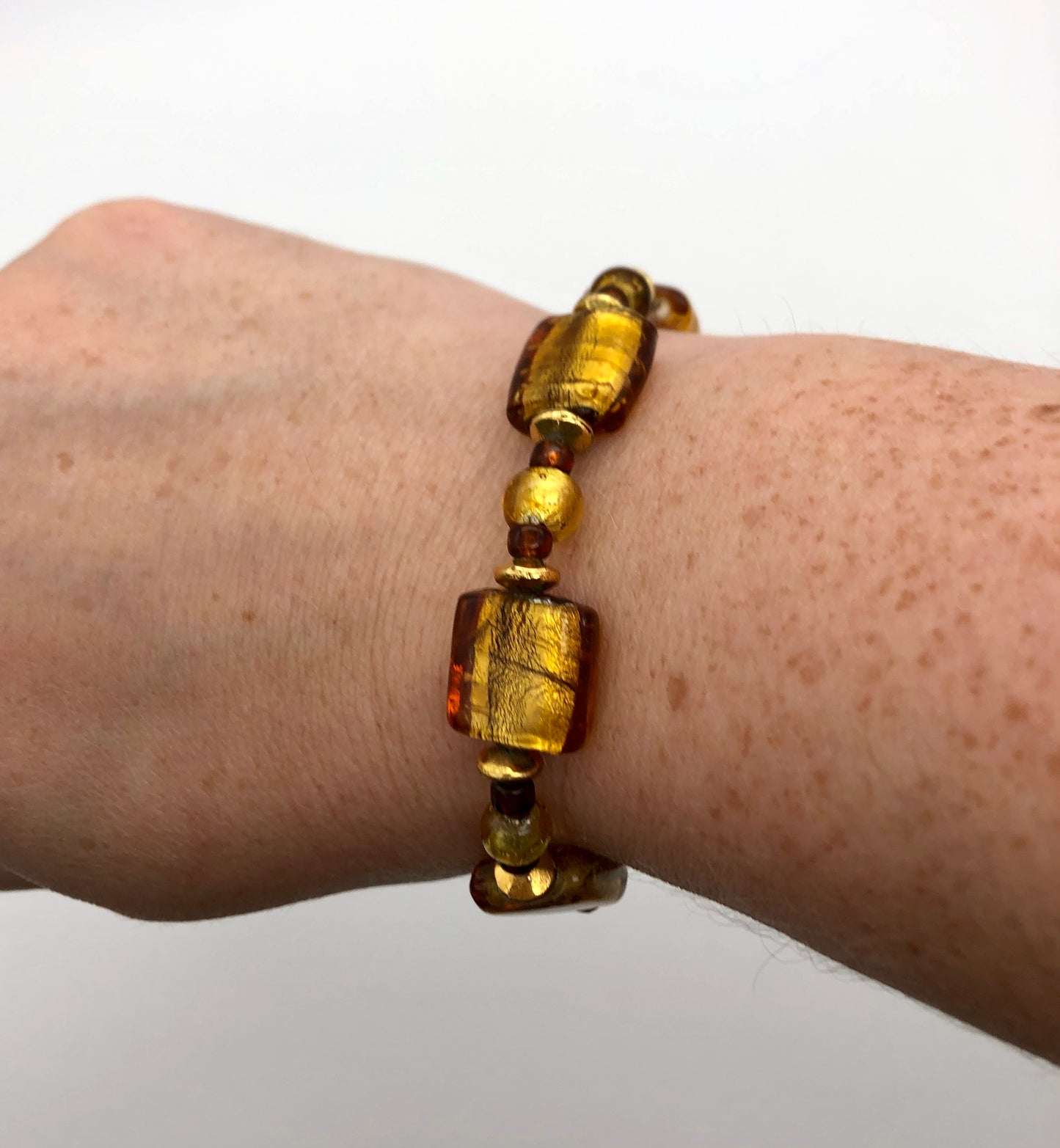 Gold foil and topaz lampwork bead stretch bracelet